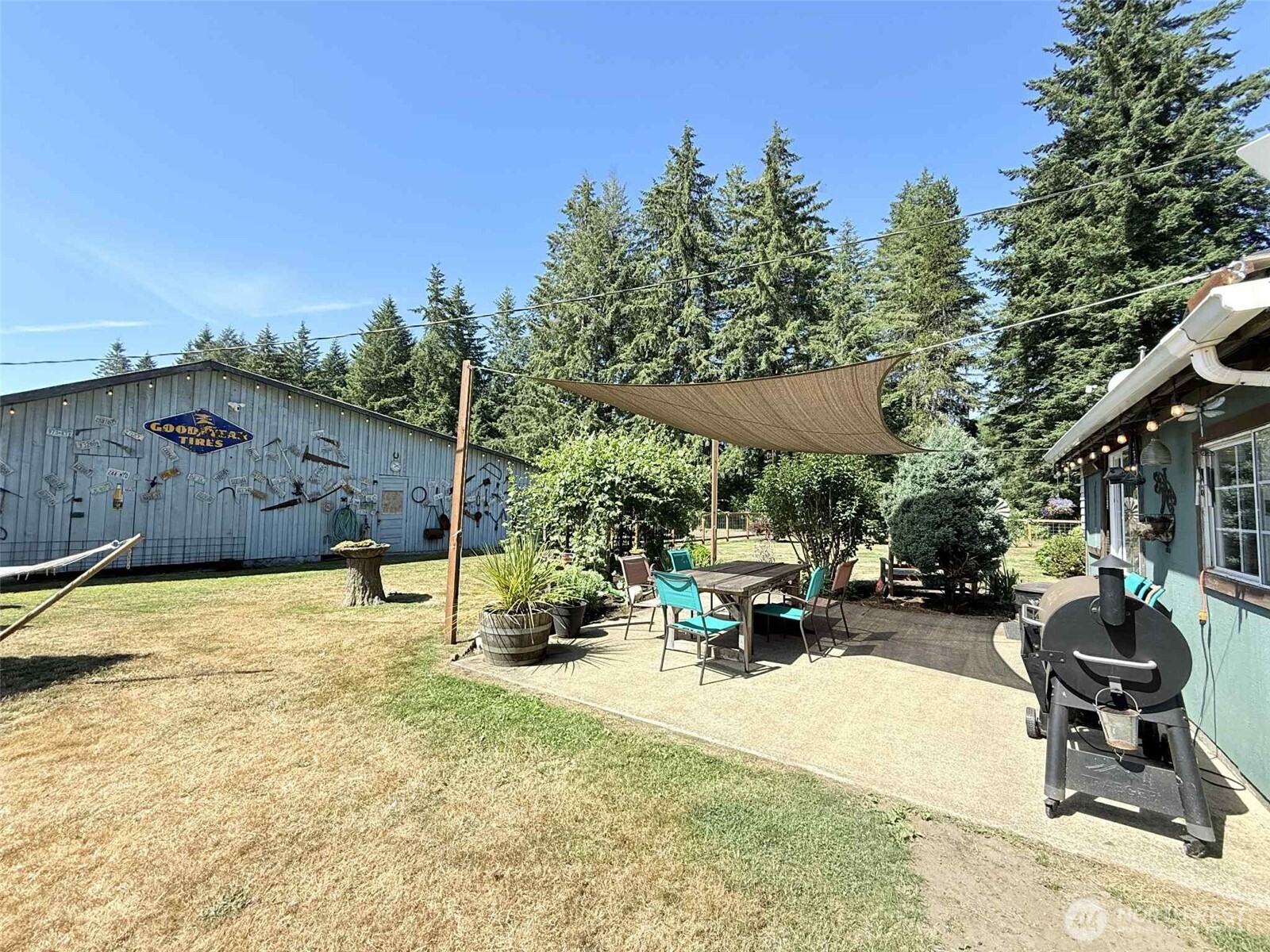 15 Heise Road South Elma, WA 98541 - Photo 24 of 40 a swimming pool with outdoor seating and yard