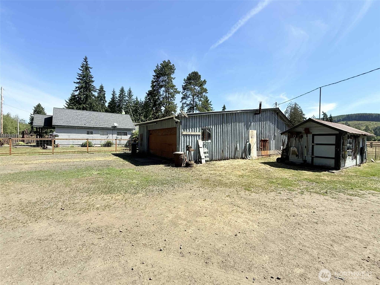 15 Heise Road South Elma, WA 98541 - Photo 25 of 40 a view of a house with backyard and trees