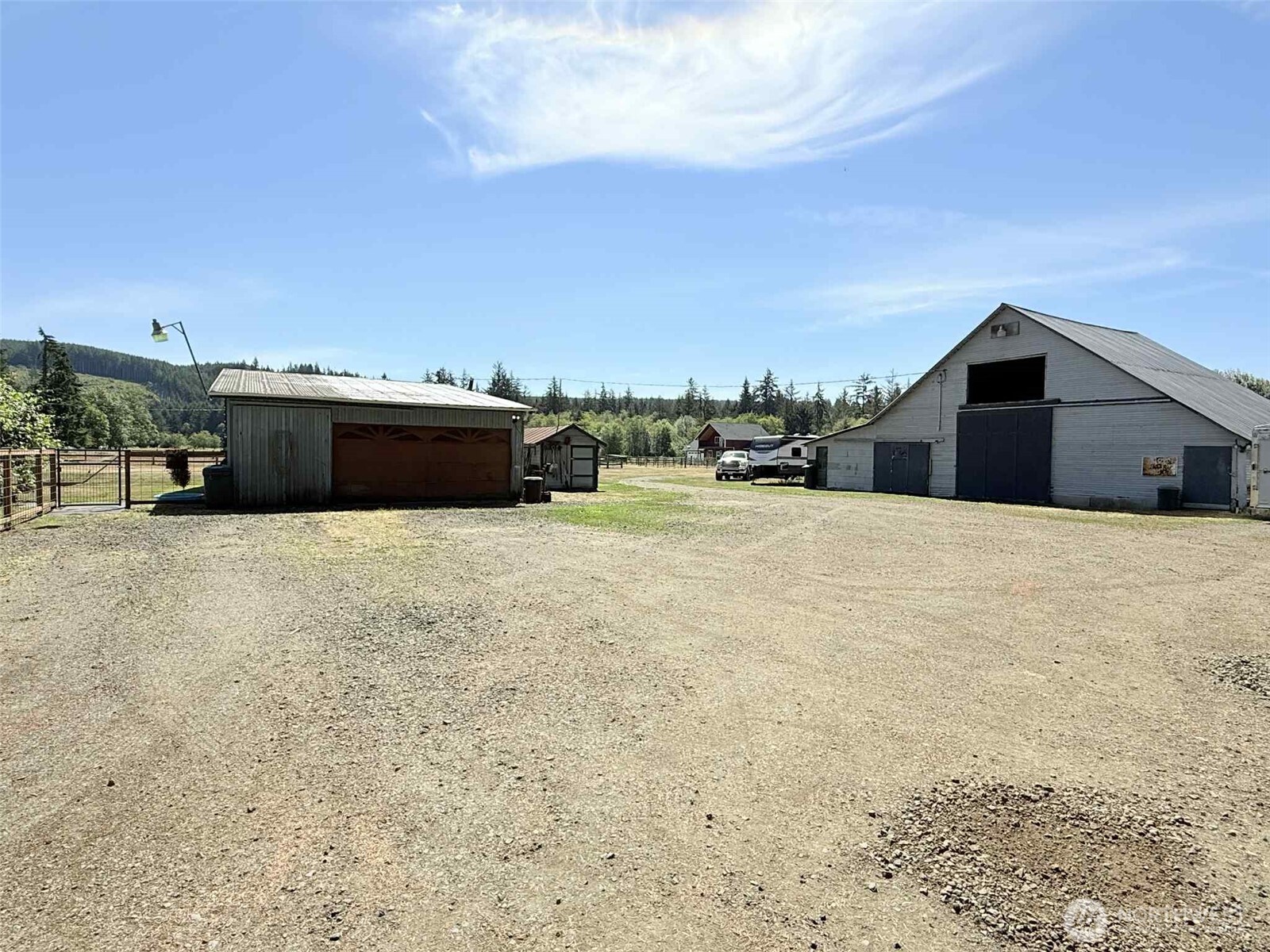 15 Heise Road South Elma, WA 98541 - Photo 27 of 40 a view of a terrace with a barbeque