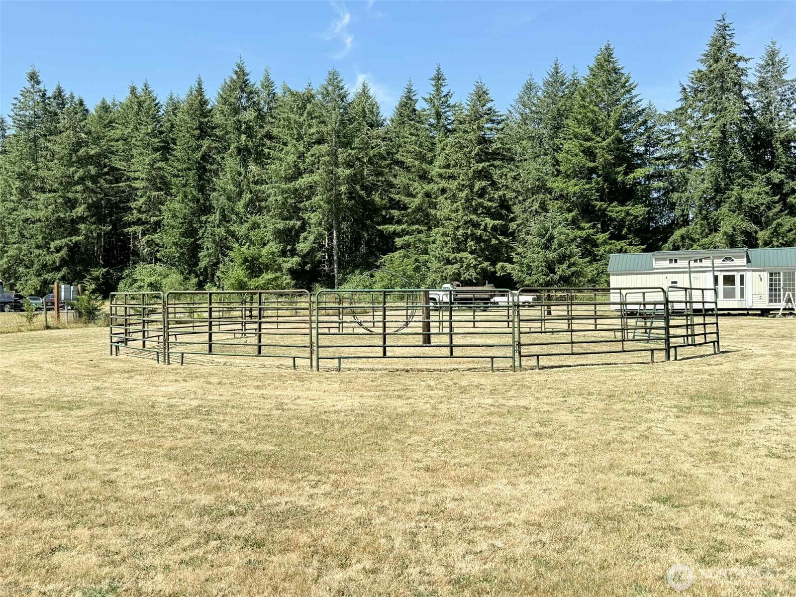 15 Heise Road South Elma, WA 98541 - Photo 33 of 40 a view of a yard with wooden fence