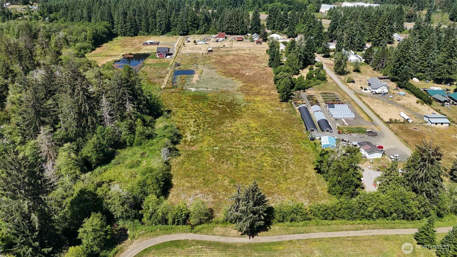 15 Heise Road South Elma, WA 98541 - Photo 35 of 40 an aerial view of residential houses with yard