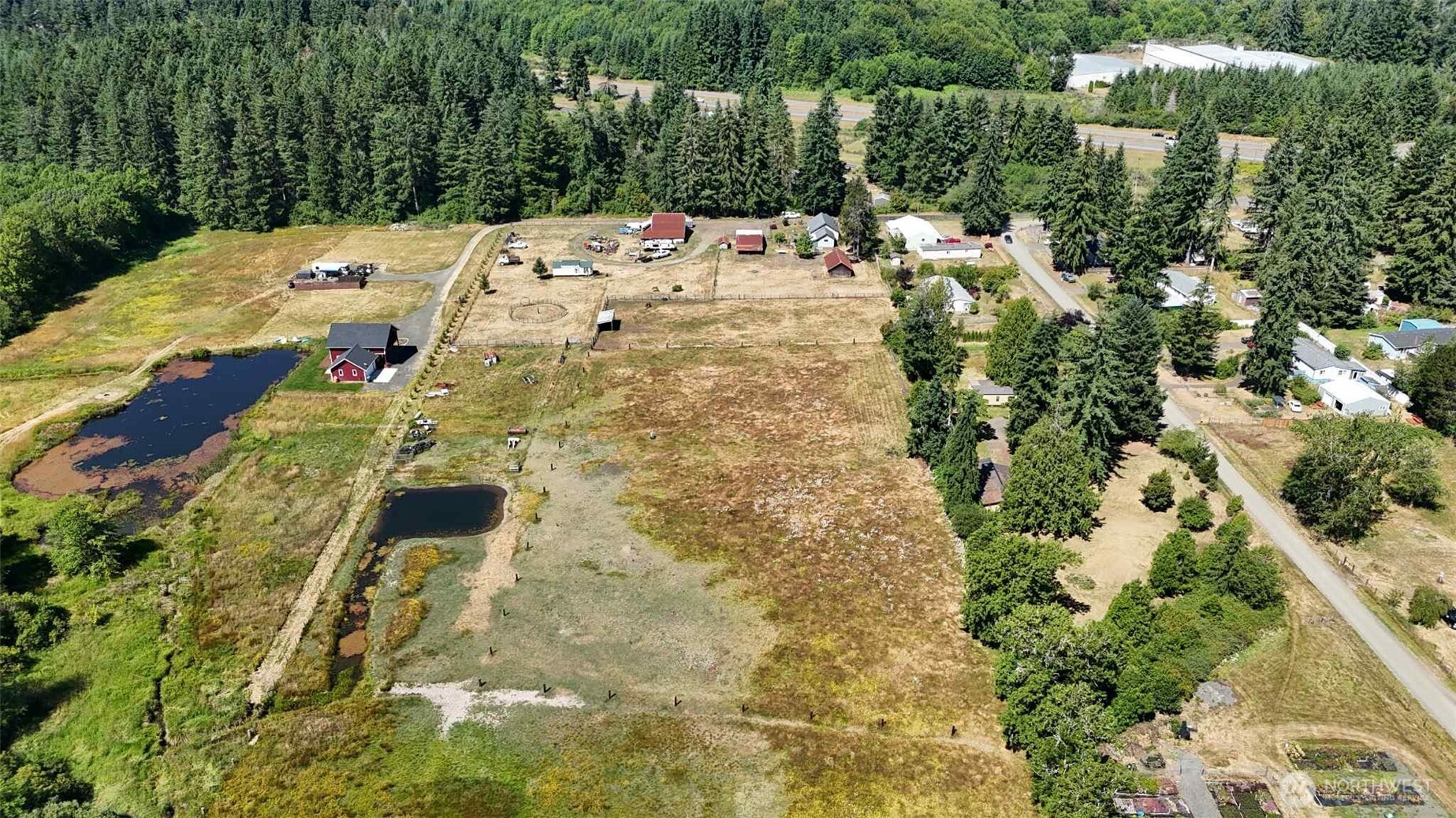 15 Heise Road South Elma, WA 98541 - Photo 36 of 40 a view of a yard with swimming pool
