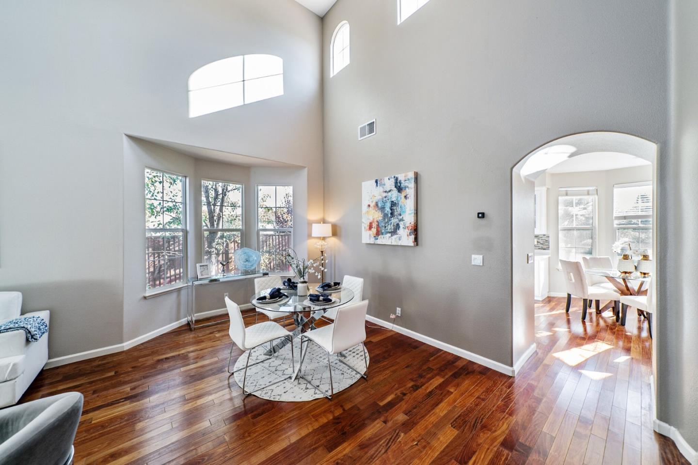 1193 South Chanterella Drive San Ramon, CA 94582 - Photo 13 of 45 a view of a dining room with furniture wooden floor and chandelier
