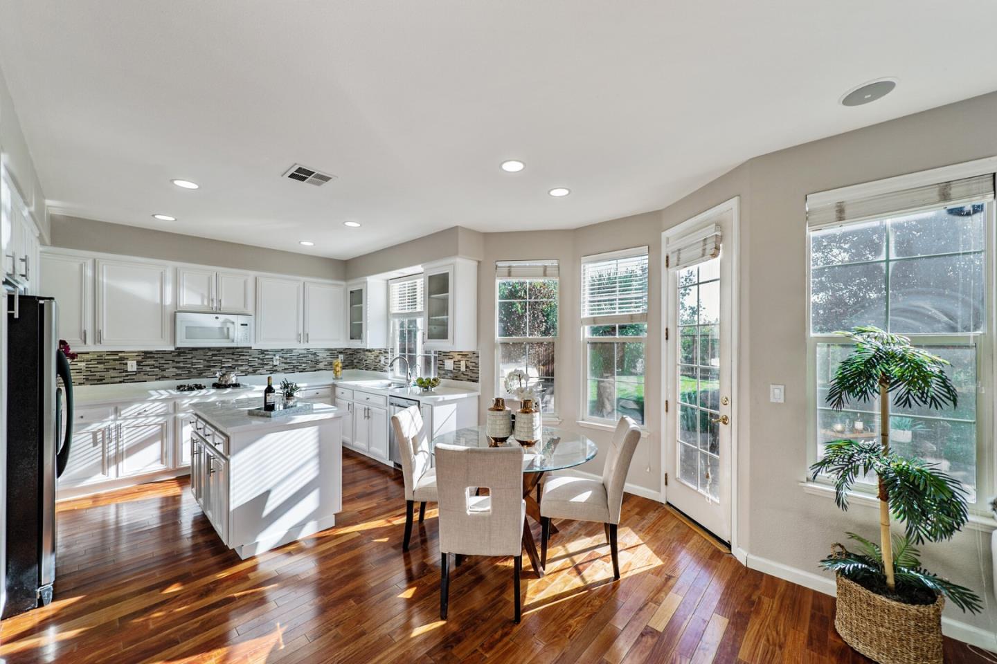 1193 South Chanterella Drive San Ramon, CA 94582 - Photo 19 of 45 a view of a dining room with furniture window and wooden floor