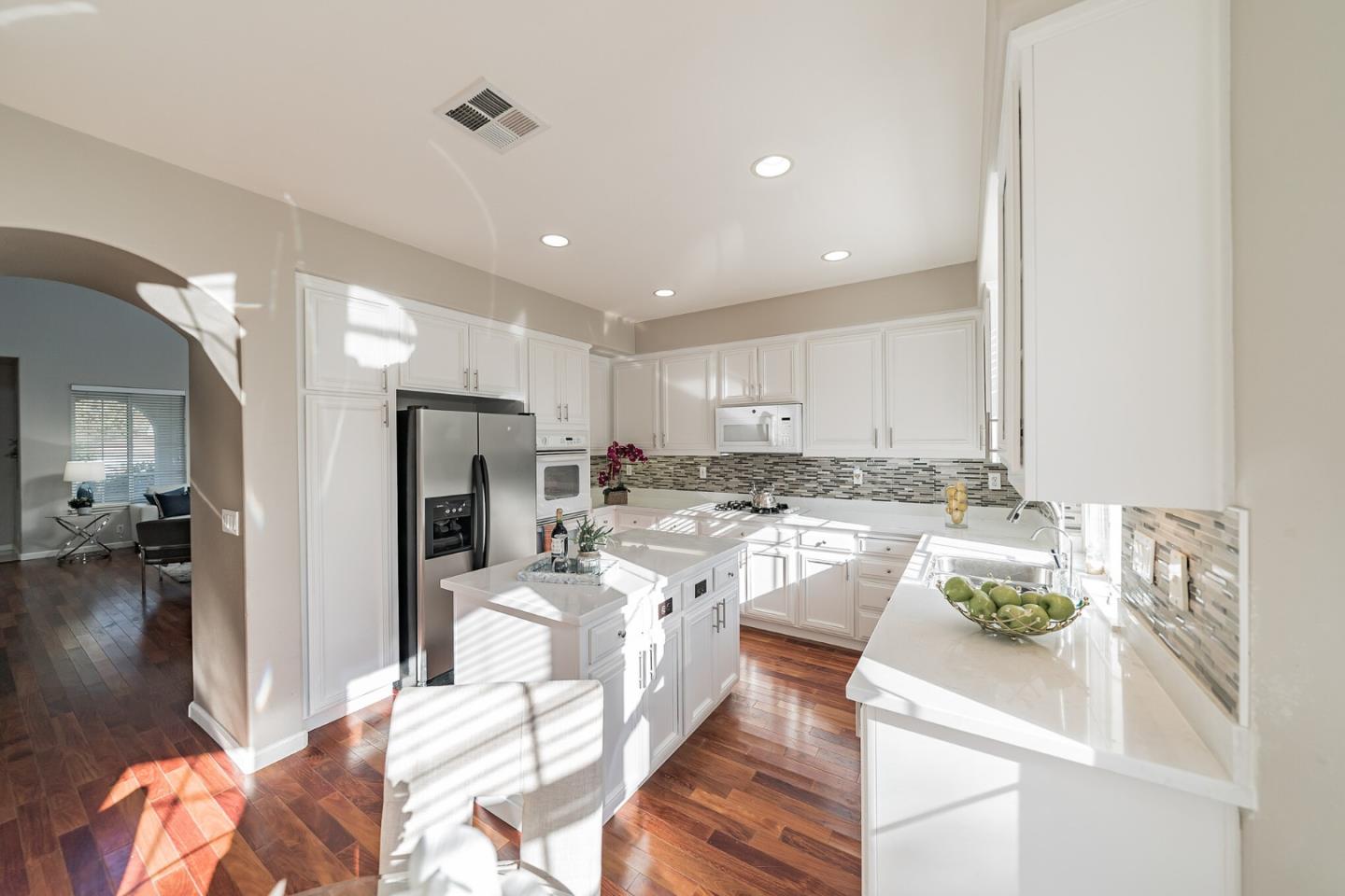 1193 South Chanterella Drive San Ramon, CA 94582 - Photo 23 of 45 a kitchen with a sink appliances and cabinets