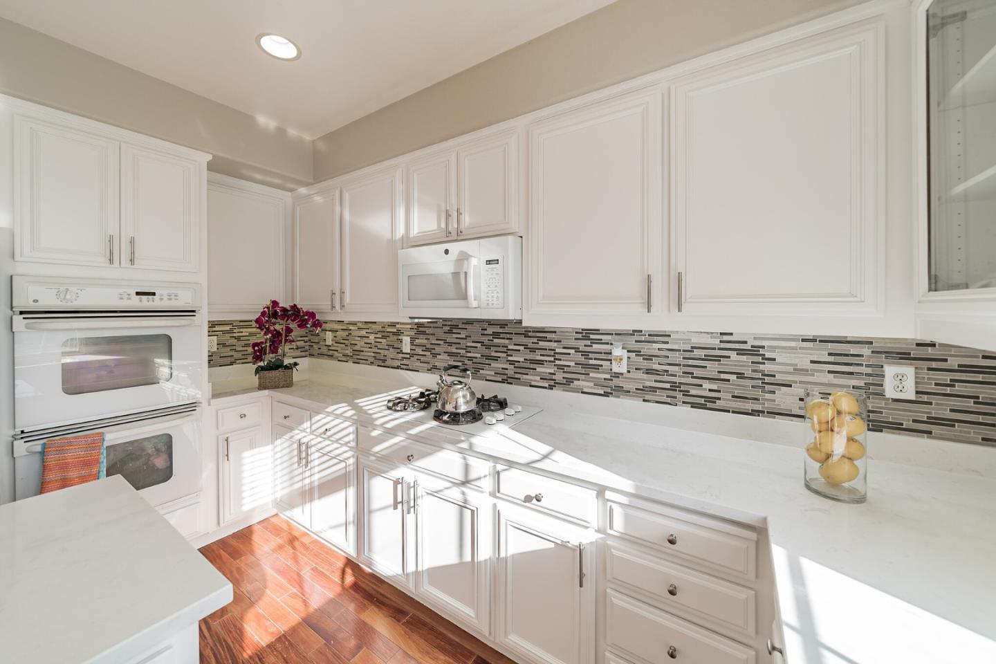 1193 South Chanterella Drive San Ramon, CA 94582 - Photo 26 of 45 a kitchen with granite countertop a sink a stove and cabinets