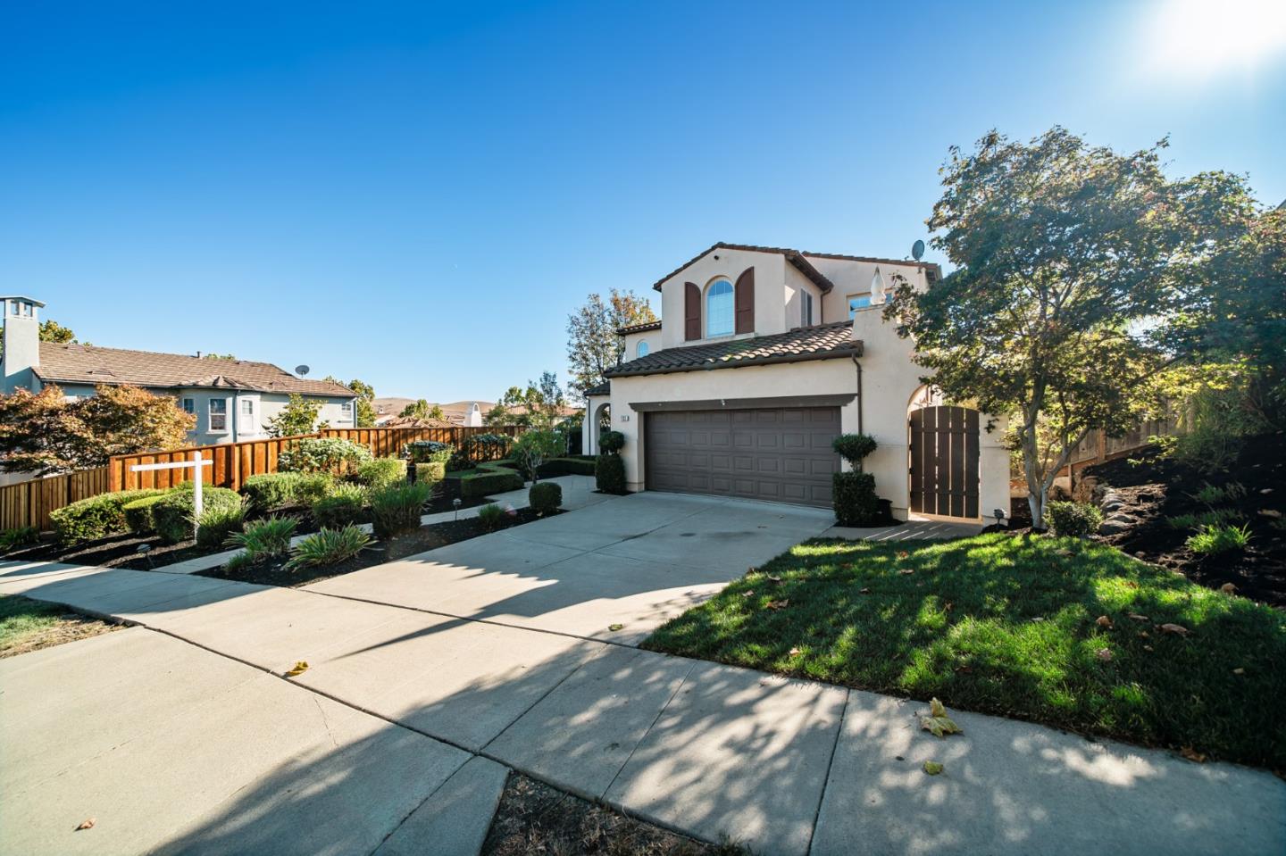 1193 South Chanterella Drive San Ramon, CA 94582 - Photo 3 of 45 a front view of a house with a yard