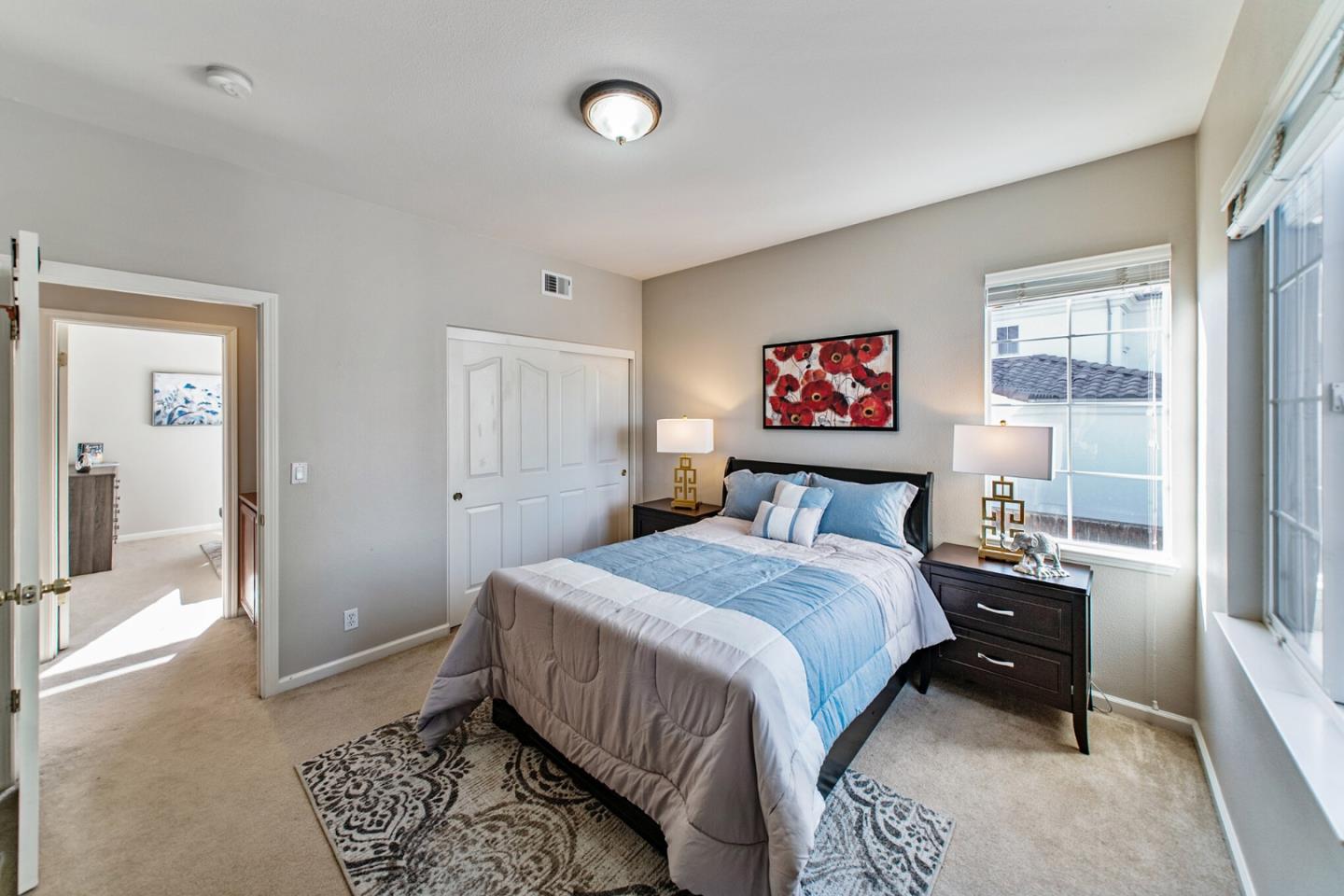 1193 South Chanterella Drive San Ramon, CA 94582 - Photo 33 of 45 a bedroom with a bed and a painting on the wall