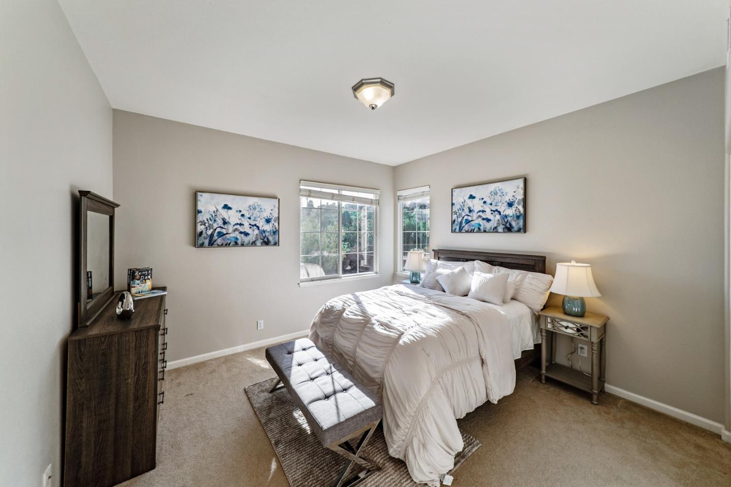 1193 South Chanterella Drive San Ramon, CA 94582 - Photo 34 of 45 a bedroom with a bed and a flat screen tv