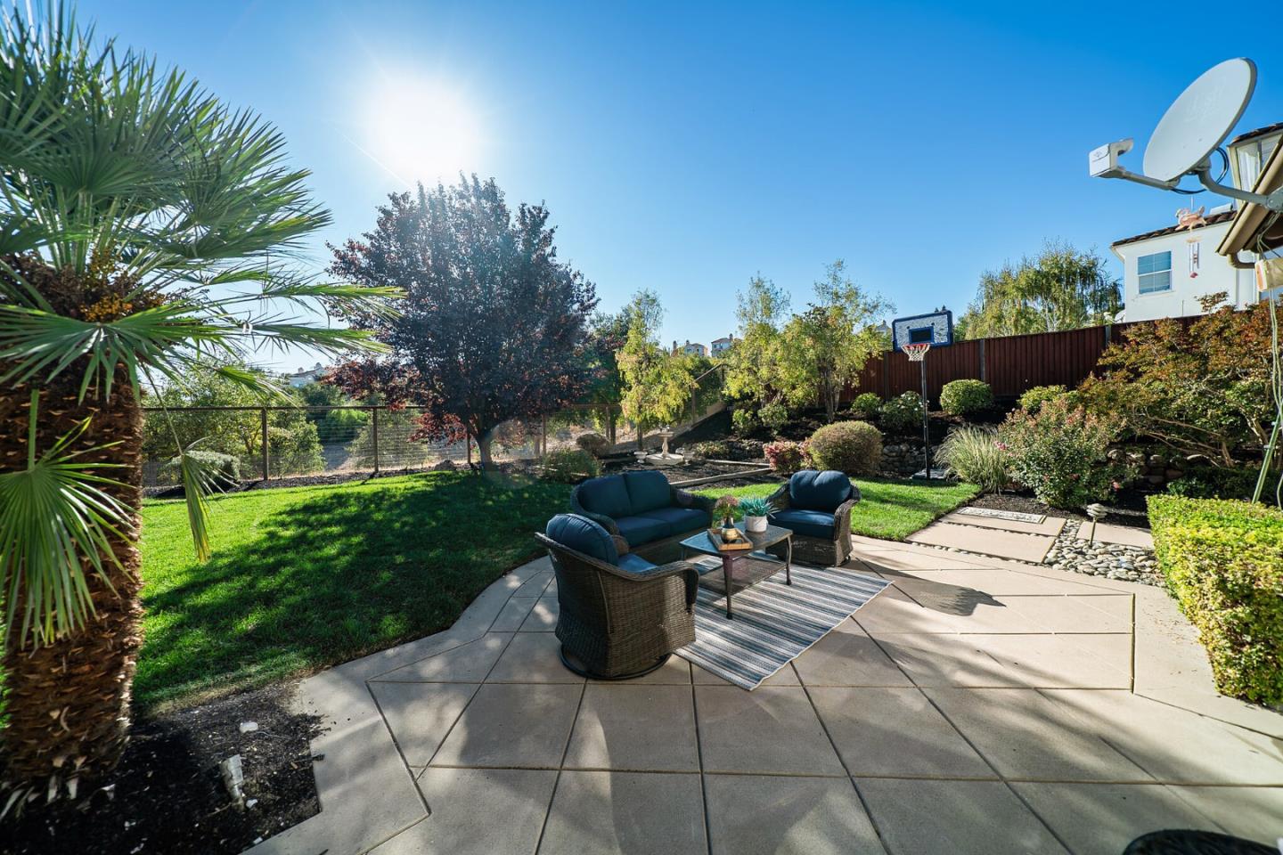 1193 South Chanterella Drive San Ramon, CA 94582 - Photo 5 of 45 a view of a chair and tables in the garden