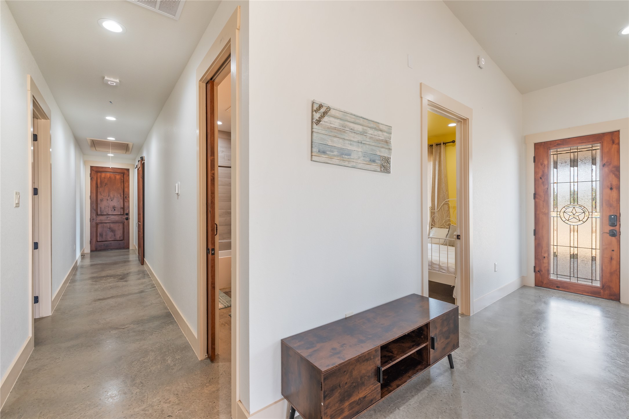928 Bendele Road Johnson City, TX 78636 - Photo 20 of 31 a view of a hallway with interior of the house