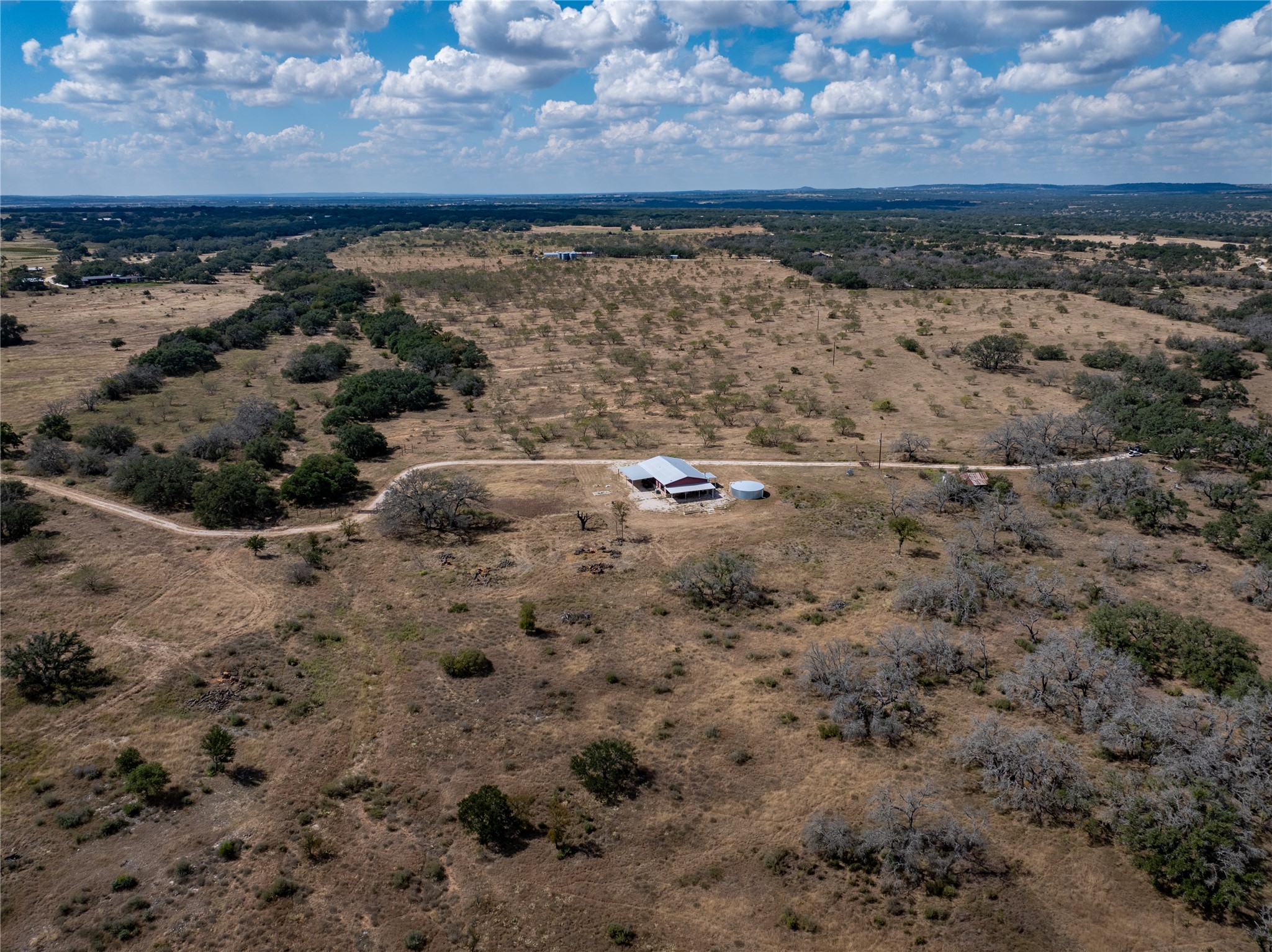 928 Bendele Road Johnson City, TX 78636 - Photo 22 of 31 a view of lake view with beach