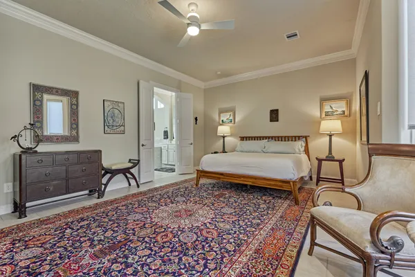 a bedroom with a bed and furniture