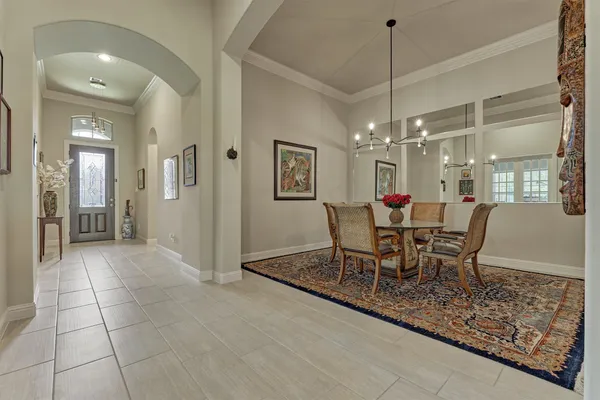 a dining room well furnished