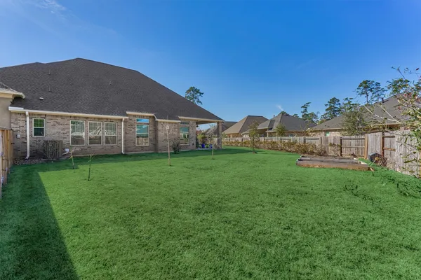 a house view with a garden space