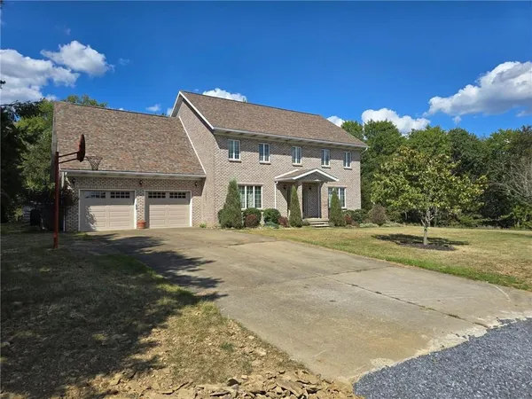 a view of house with outdoor space and street view
