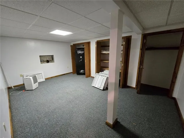 a bathroom with a glass door shower