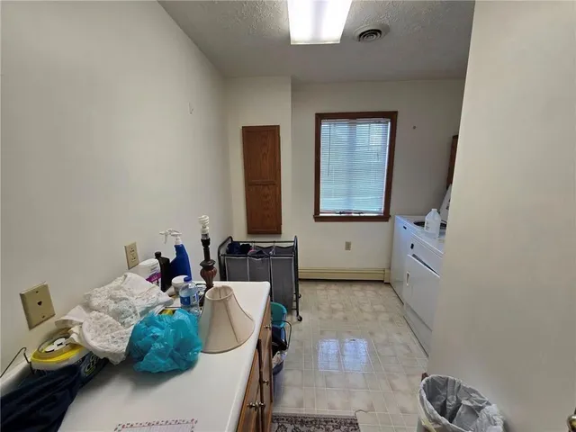 a view of balcony with wooden floor