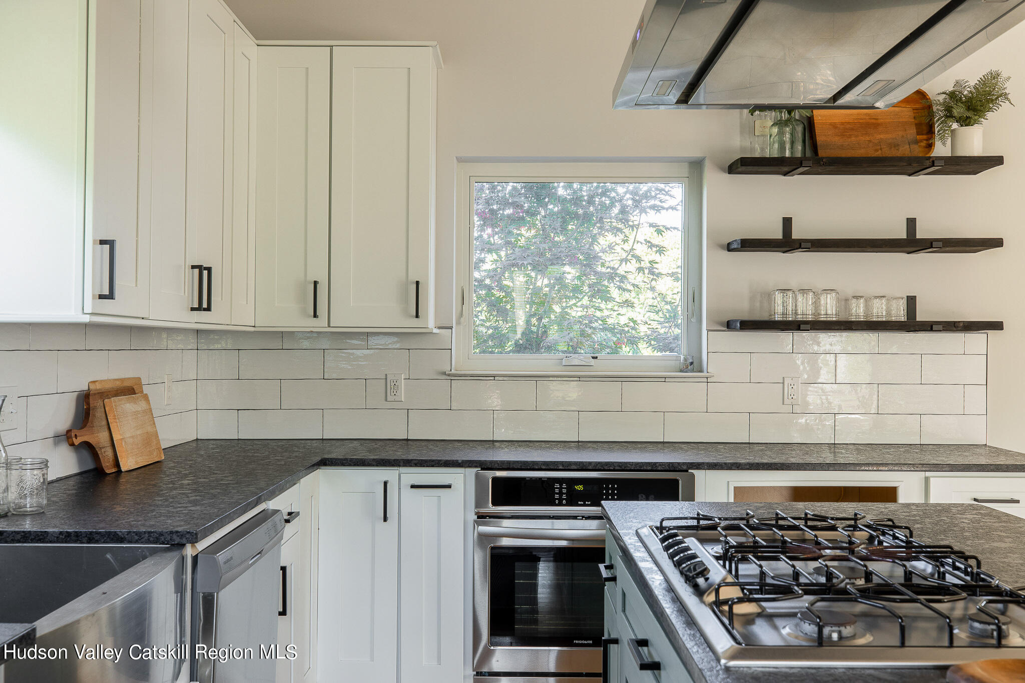 271 Ridge Road Milton, NY 12547 - Photo 8 of 29 a kitchen with stainless steel appliances a stove sink and cabinets