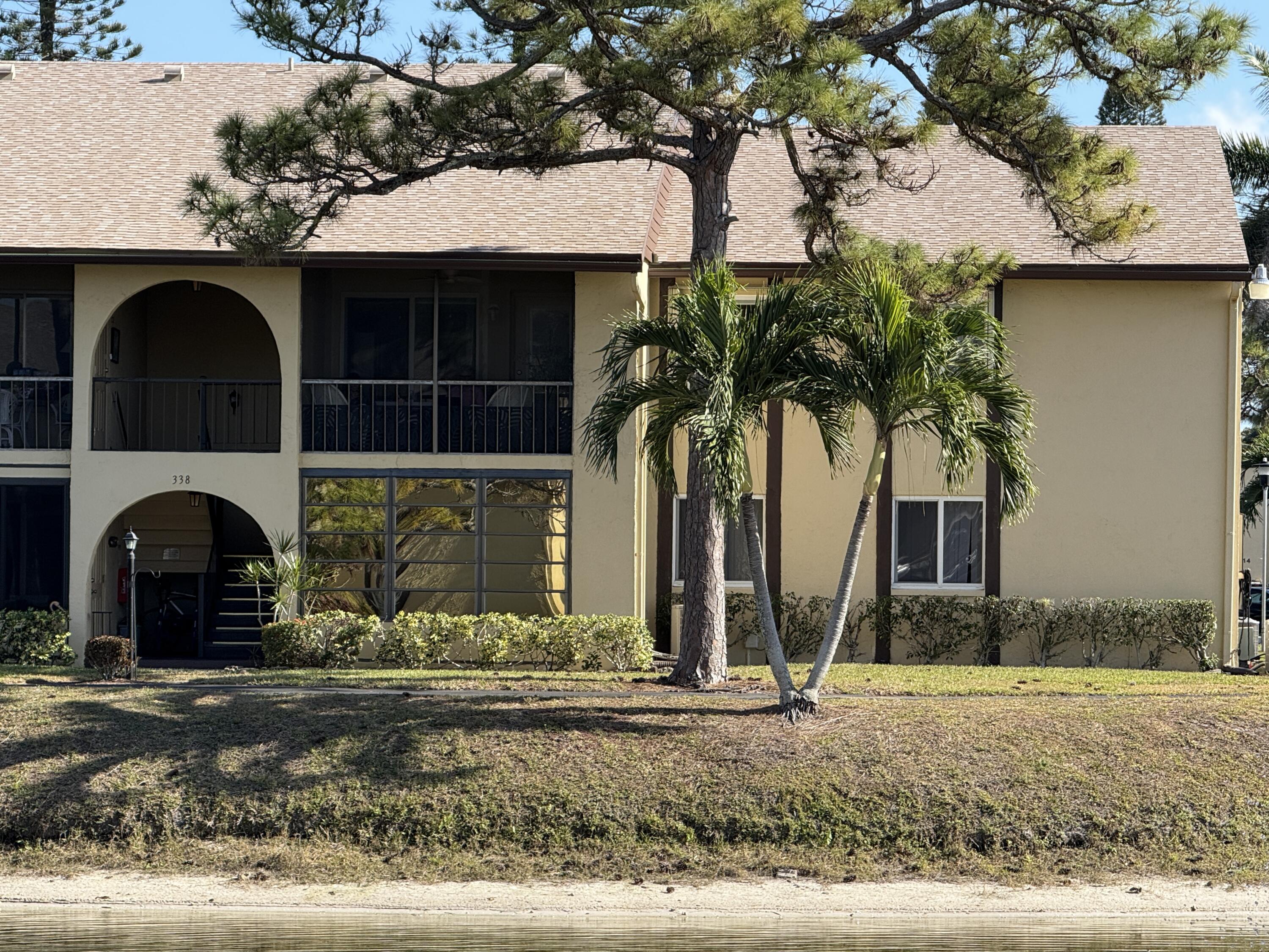 338 Pine Ridge Circle, Unit B2 Greenacres, FL 33463 - Photo 2 of 55 Front