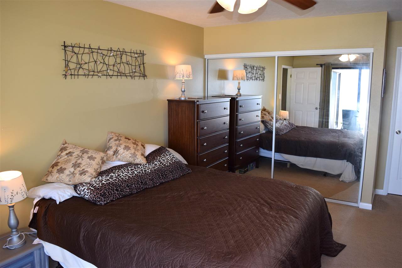 5011 Lower Kula Road Kula, HI 96790 - Photo 5 of 14 a bedroom with a bed and window