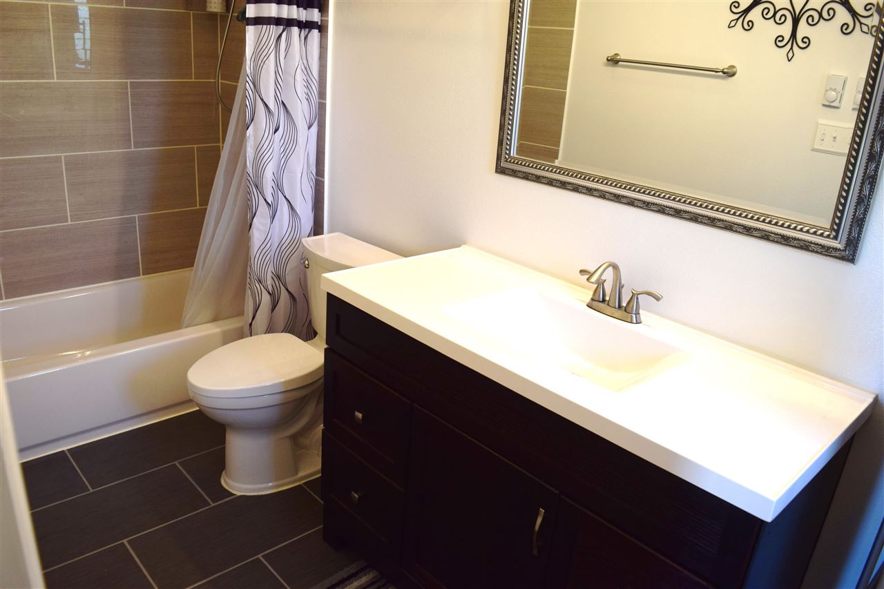 5011 Lower Kula Road Kula, HI 96790 - Photo 6 of 14 a bathroom with a sink a toilet and shower