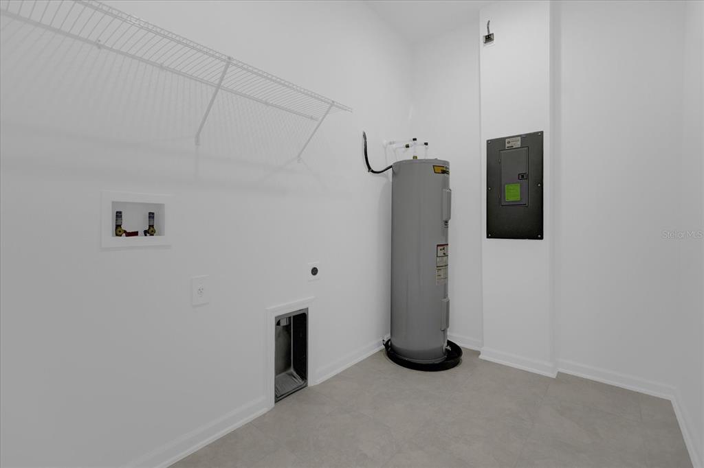 6049 Blissful Street Clermont, FL 34714 - Photo 13 of 25 an empty room with windows