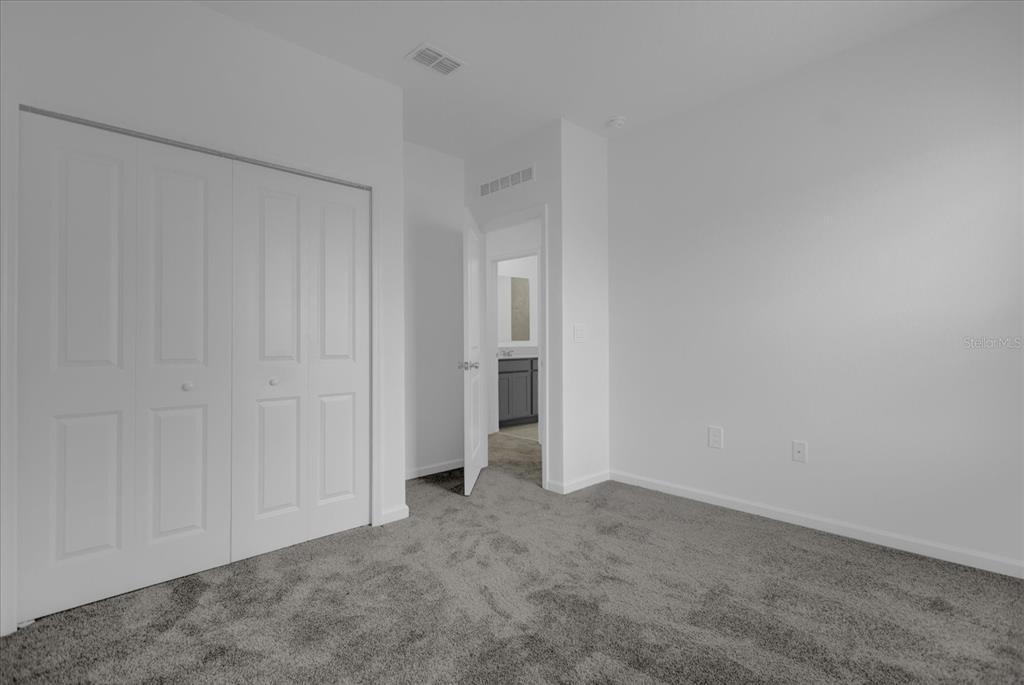 6049 Blissful Street Clermont, FL 34714 - Photo 14 of 25 a view of an empty room and entryway
