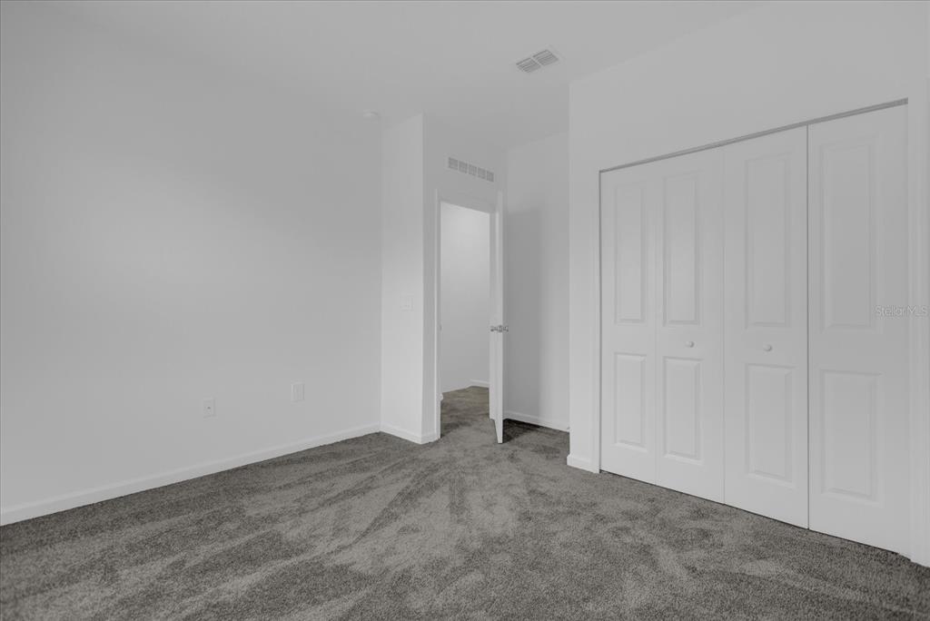 6049 Blissful Street Clermont, FL 34714 - Photo 21 of 25 a view of an empty room