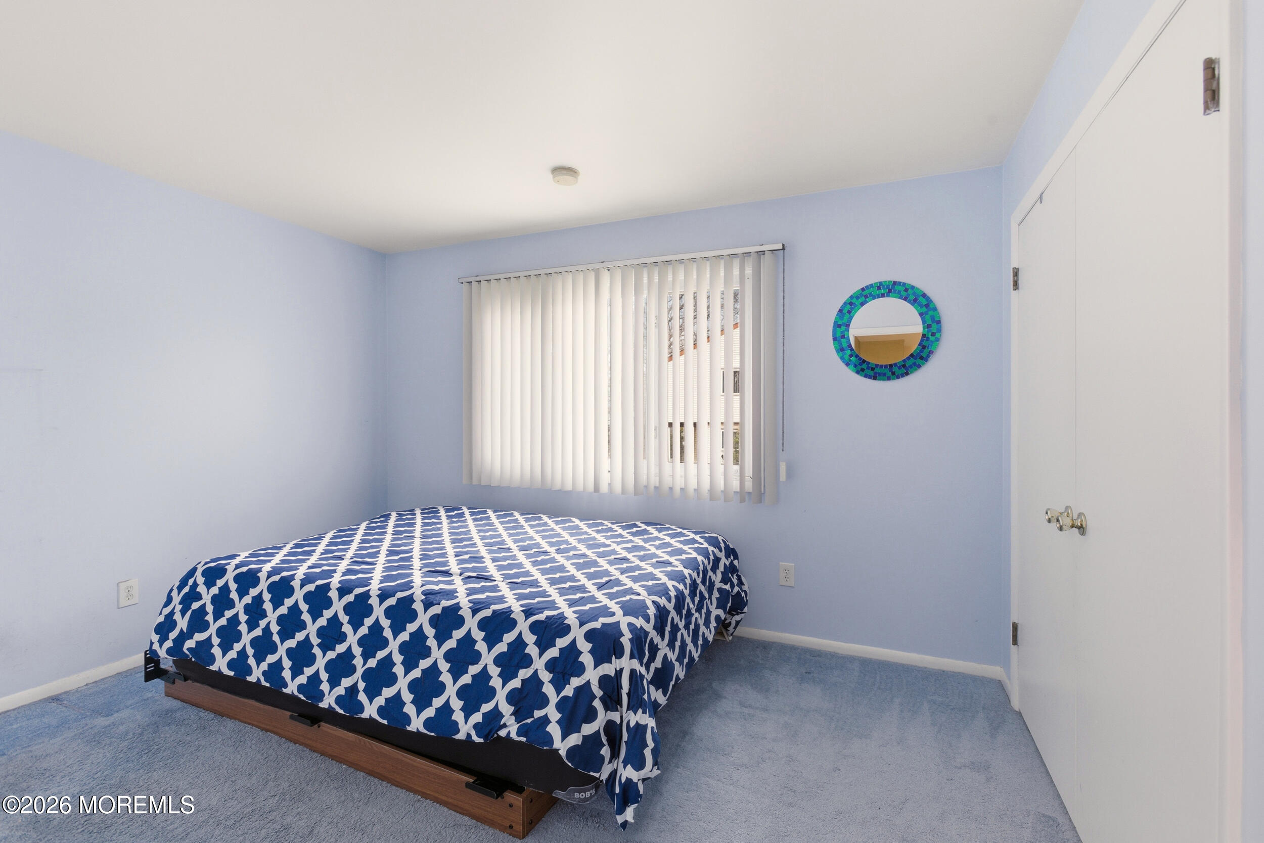 31 Chelsea Road Jackson, NJ 08527 - Photo 11 of 57 a bedroom with a bed and window