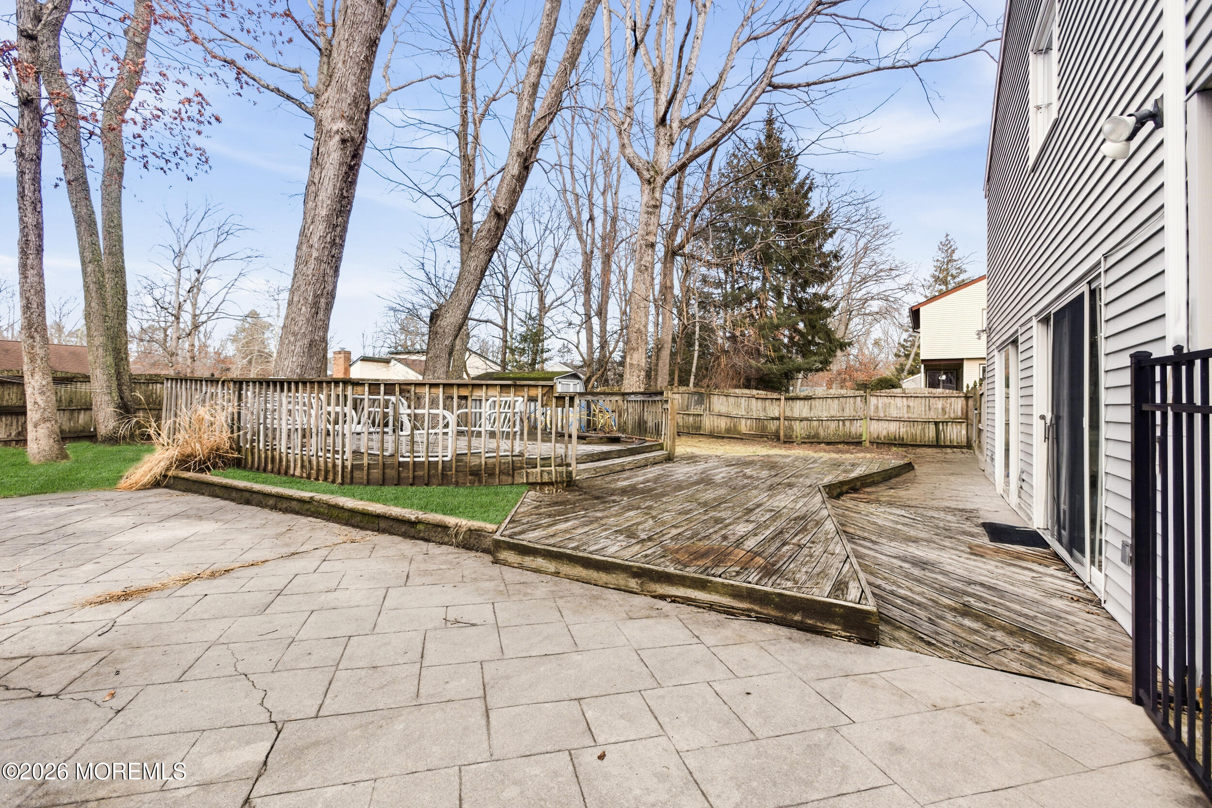 31 Chelsea Road Jackson, NJ 08527 - Photo 13 of 57 a view of a yard with wooden fence