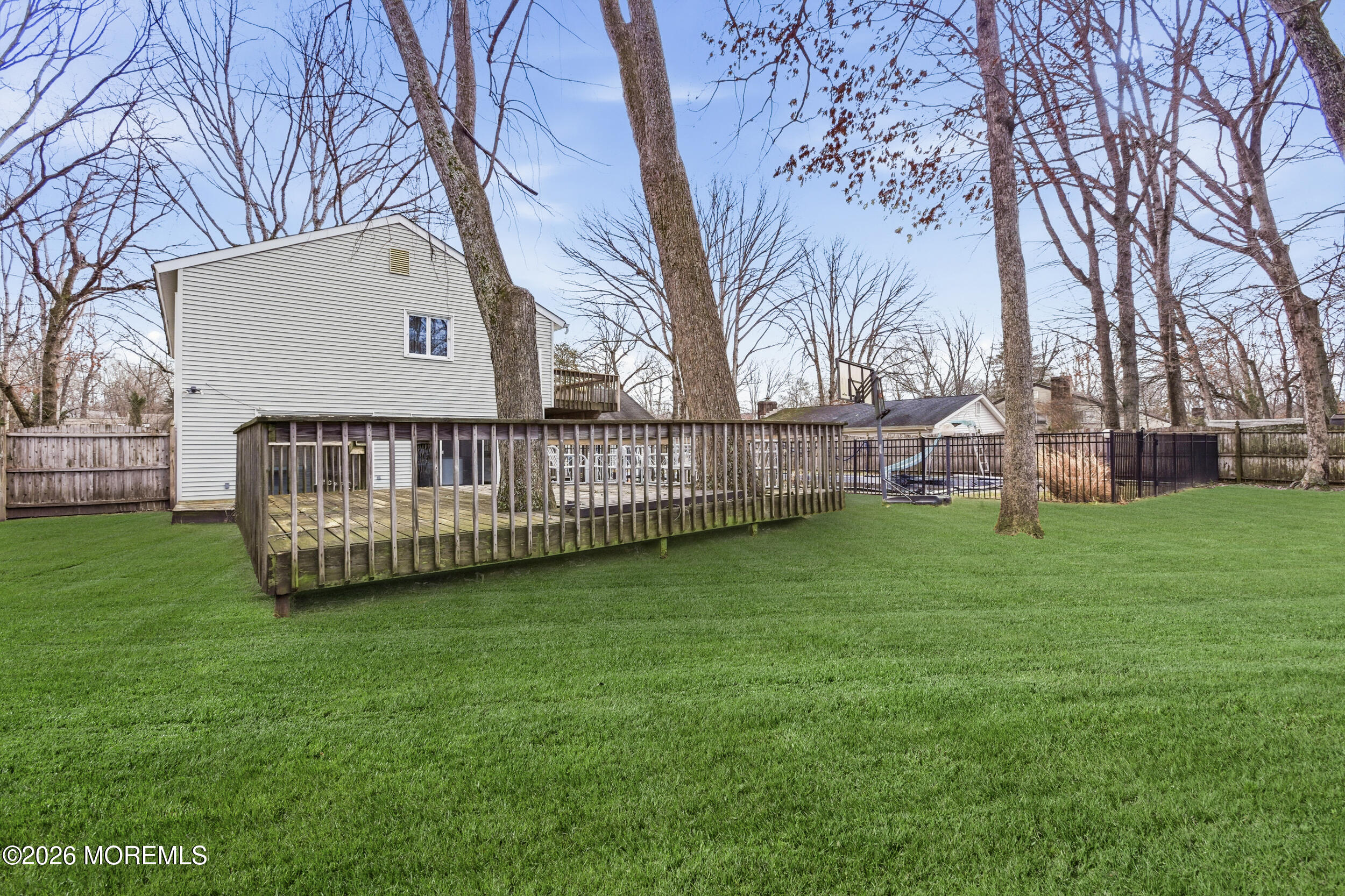 31 Chelsea Road Jackson, NJ 08527 - Photo 14 of 57 a view of a porch with a yard