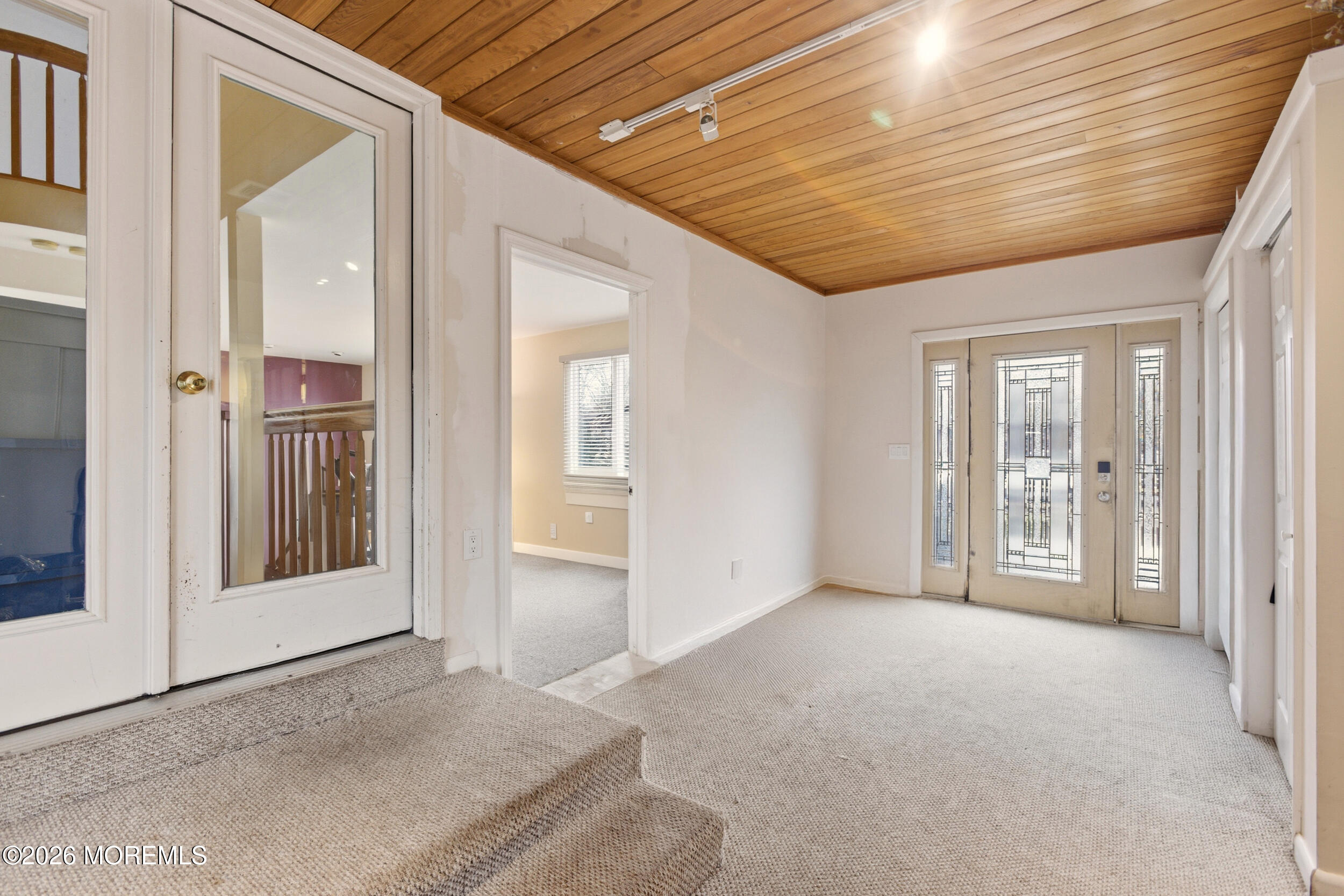 31 Chelsea Road Jackson, NJ 08527 - Photo 15 of 57 a view of an empty room with glass door