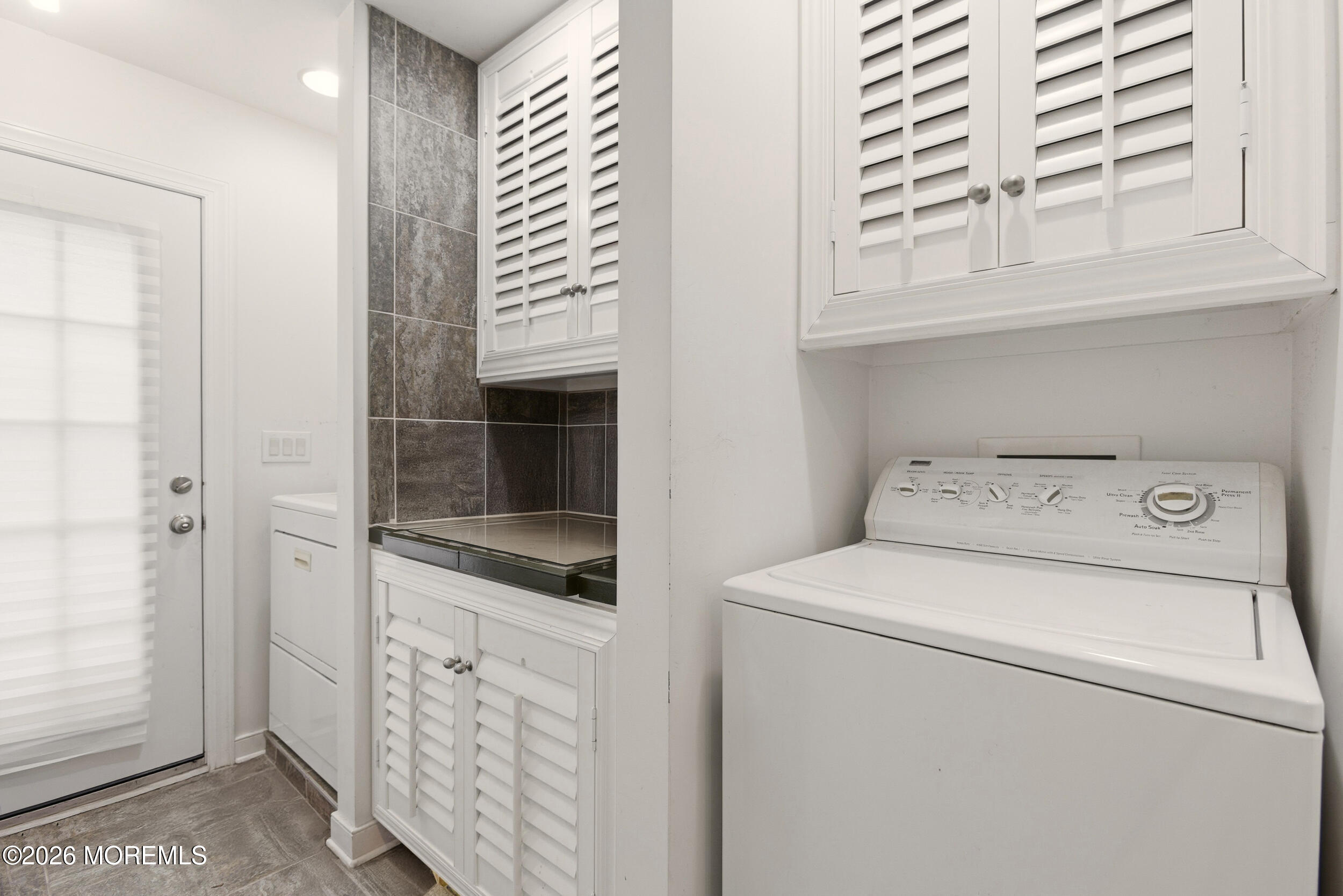 31 Chelsea Road Jackson, NJ 08527 - Photo 19 of 57 a utility room with dryer and washer