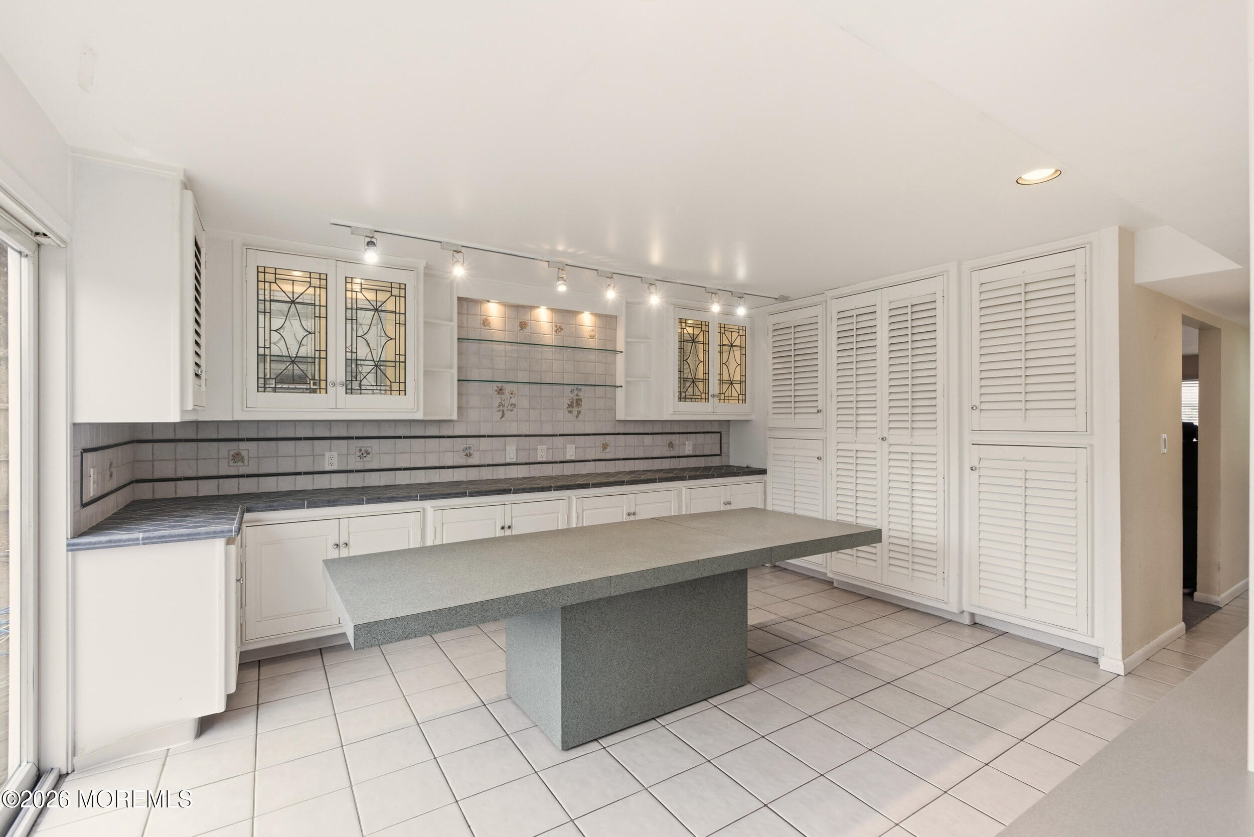 31 Chelsea Road Jackson, NJ 08527 - Photo 2 of 57 a kitchen with a sink cabinets and window