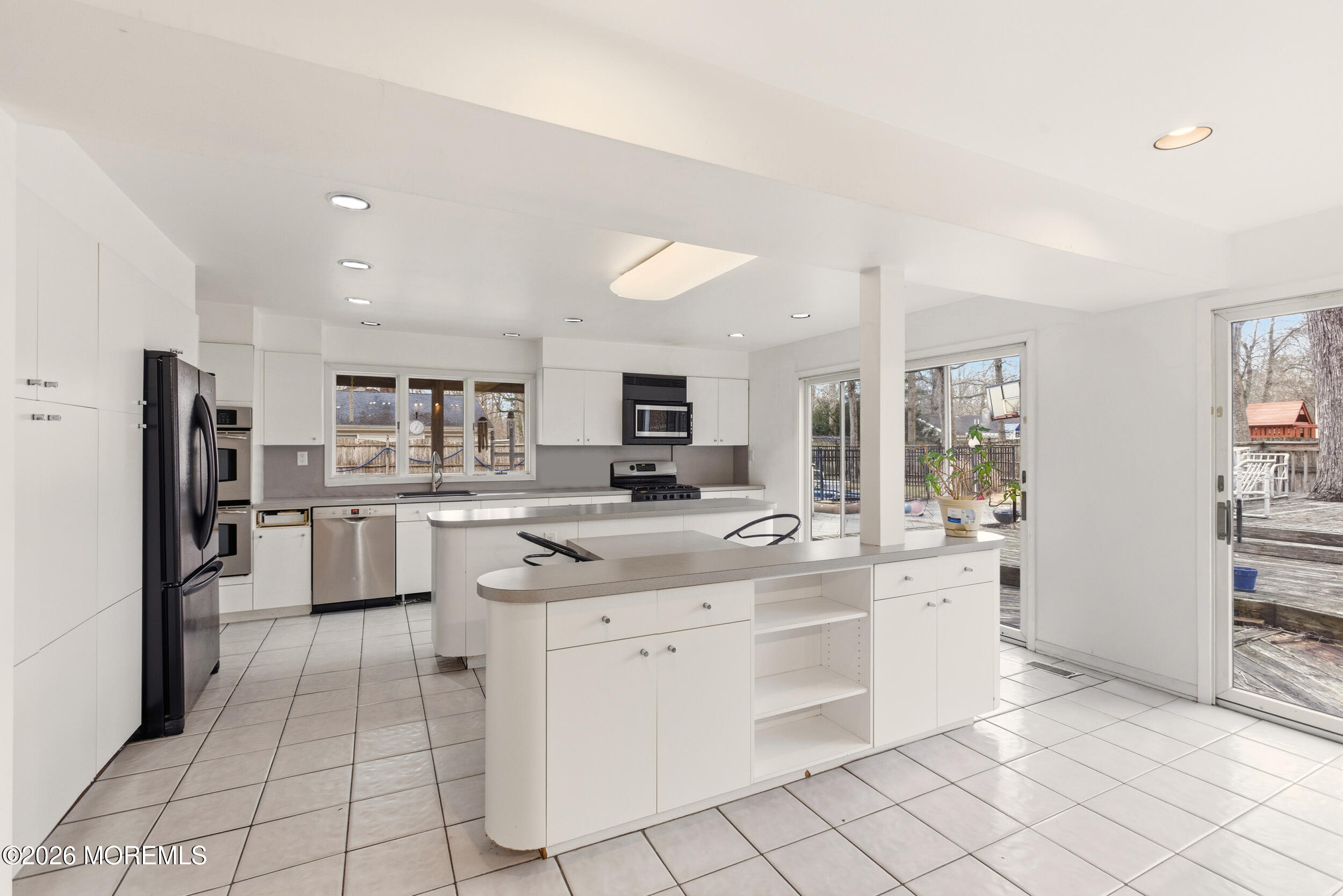 31 Chelsea Road Jackson, NJ 08527 - Photo 44 of 57 a large white kitchen with cabinets