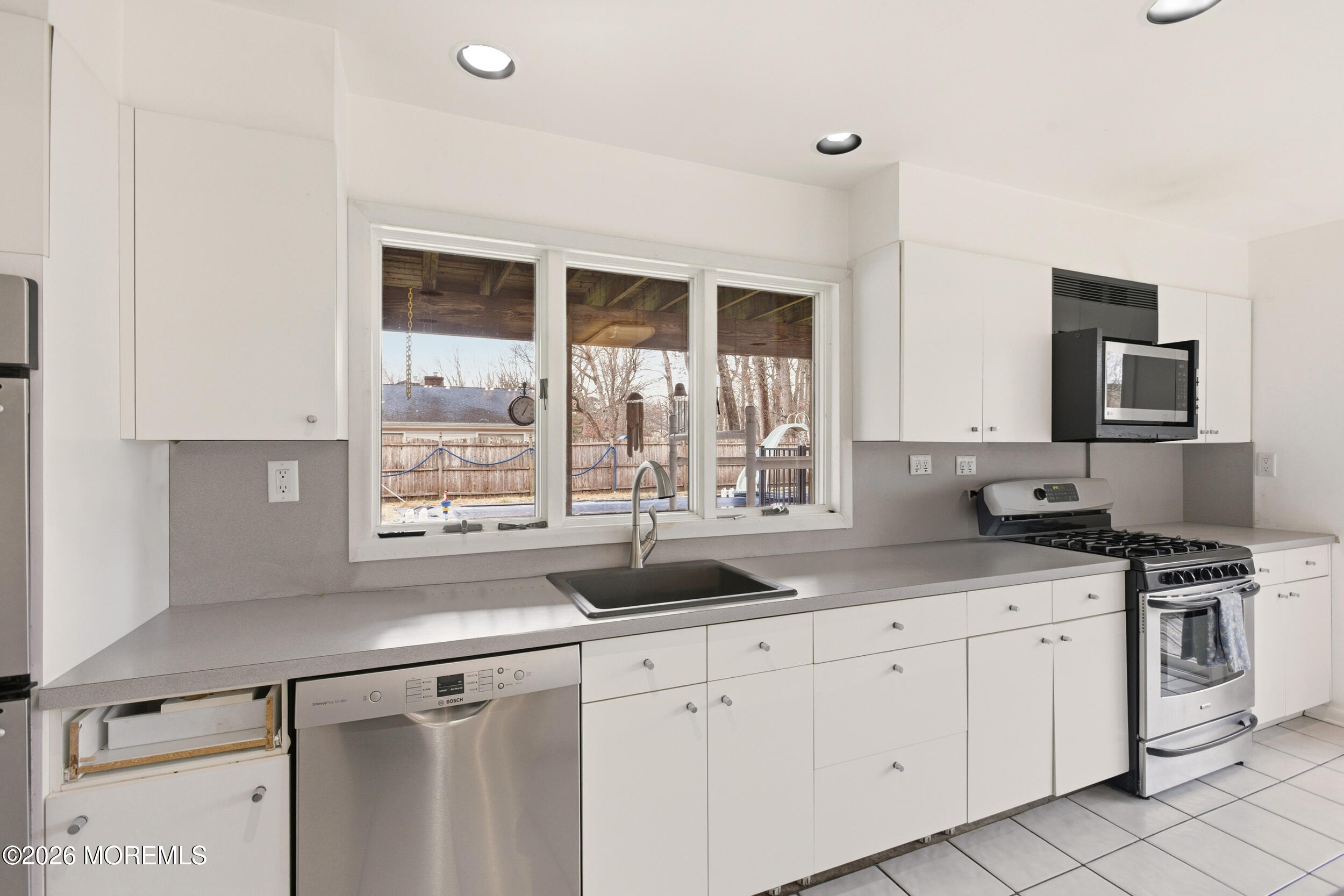 31 Chelsea Road Jackson, NJ 08527 - Photo 45 of 57 a kitchen with appliances a sink and cabinets