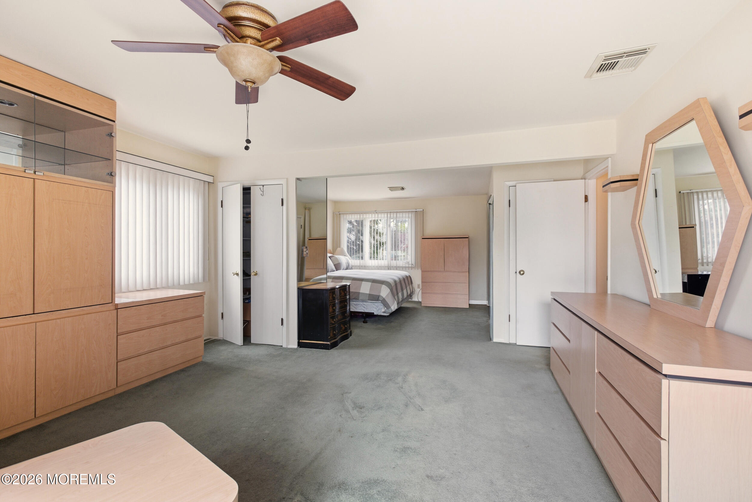 31 Chelsea Road Jackson, NJ 08527 - Photo 46 of 57 a view of a bedroom with furniture and a ceiling fan