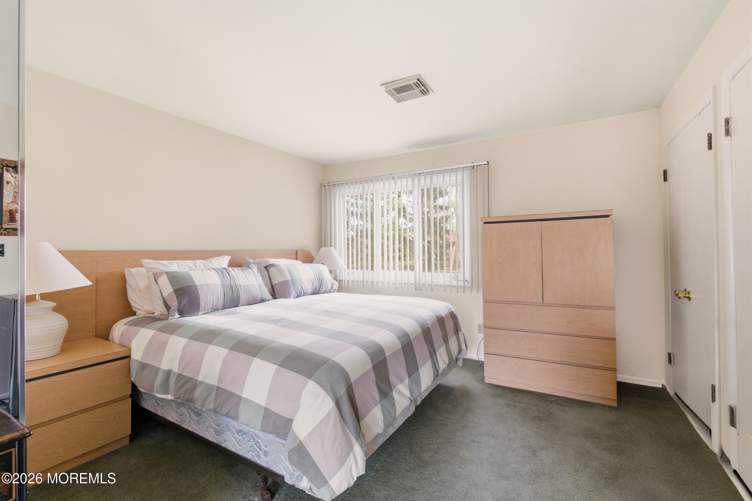 31 Chelsea Road Jackson, NJ 08527 - Photo 47 of 57 a bedroom with a bed and a window