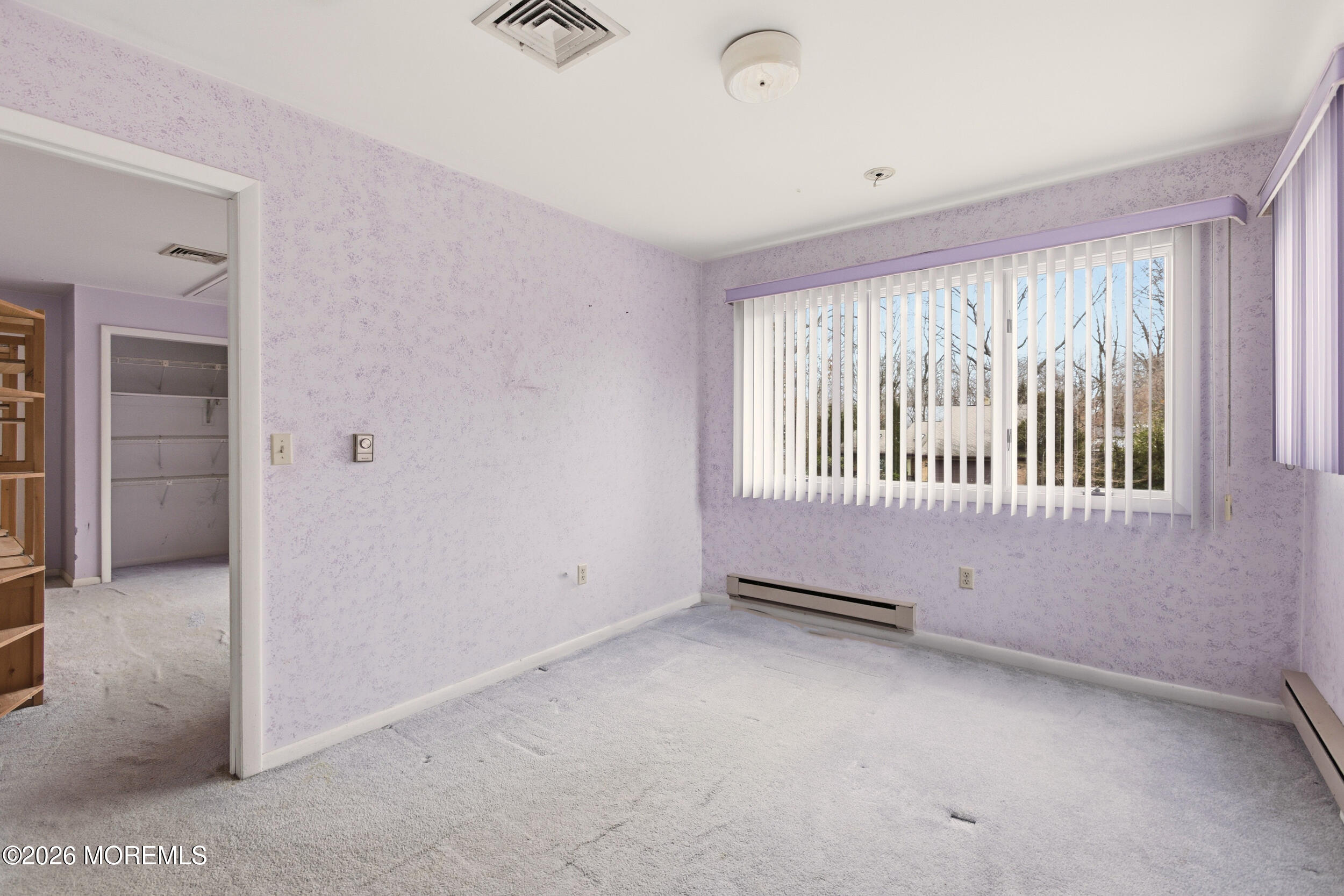31 Chelsea Road Jackson, NJ 08527 - Photo 7 of 57 an empty room with windows