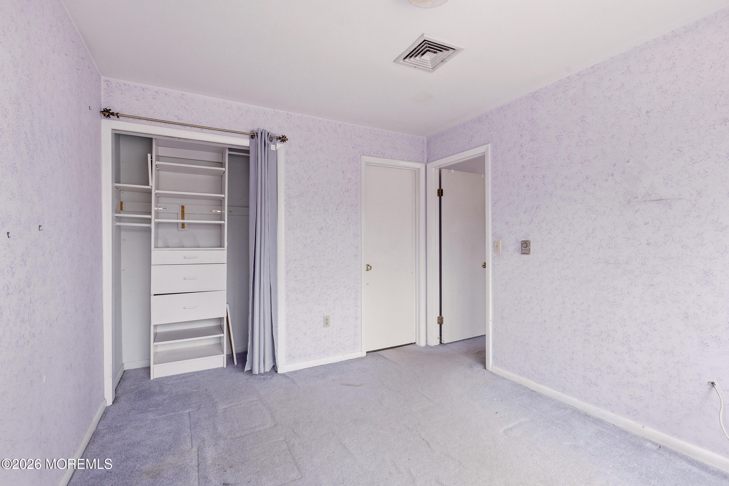 31 Chelsea Road Jackson, NJ 08527 - Photo 8 of 57 a view of an empty room