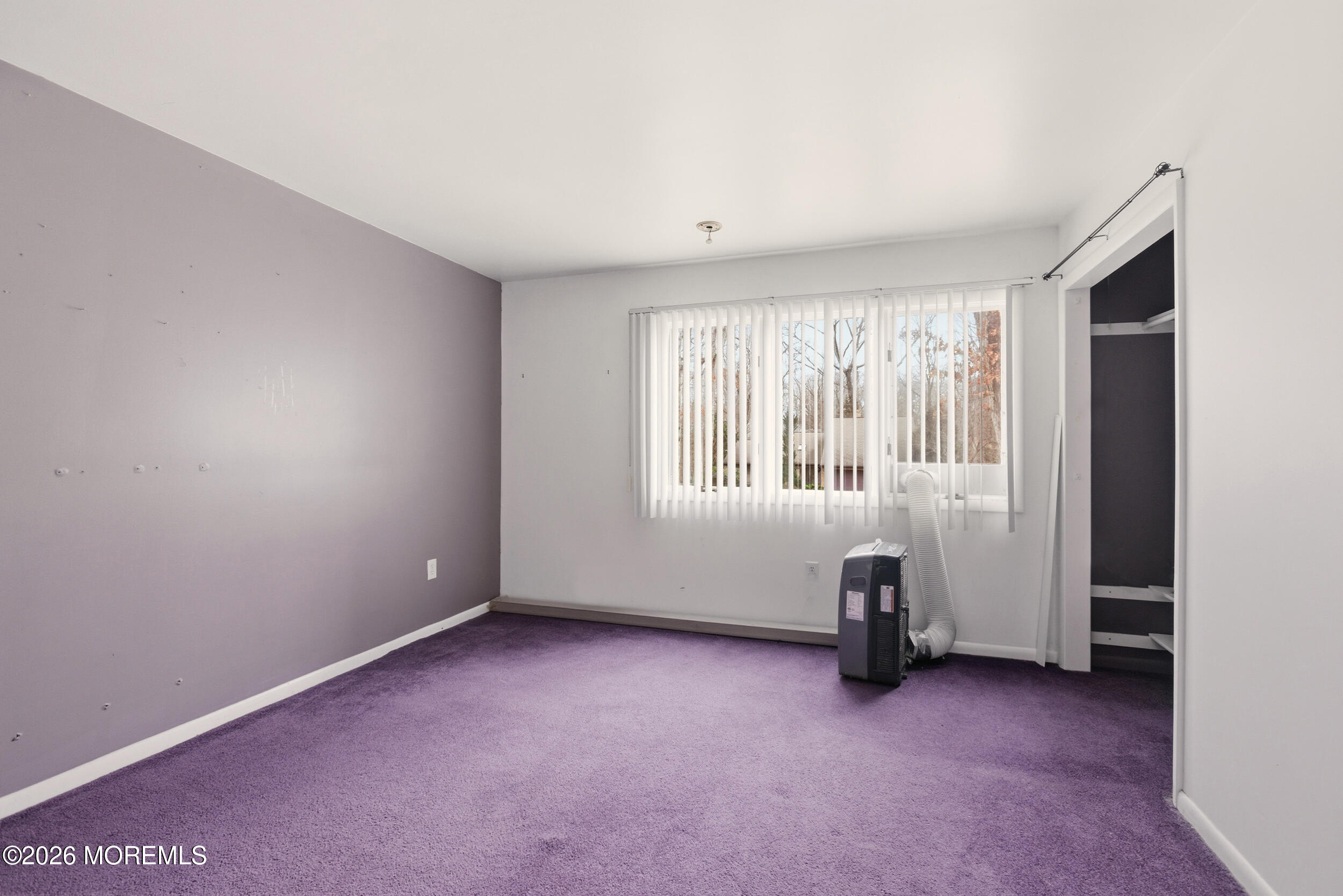 31 Chelsea Road Jackson, NJ 08527 - Photo 10 of 57 an empty room with a window