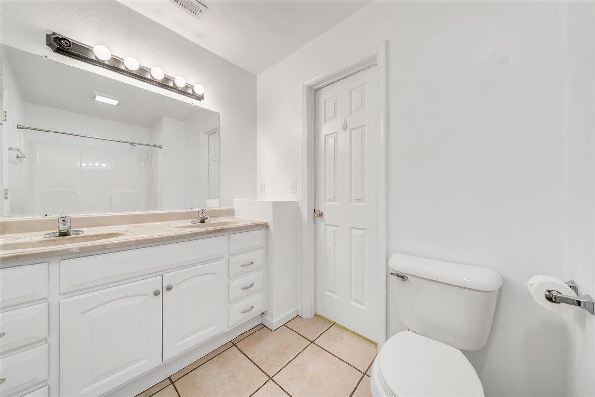 3824 Yellow Mountain Road Southeast Roanoke, VA 24014 - Photo 20 of 50 a bathroom with a toilet sink and mirror
