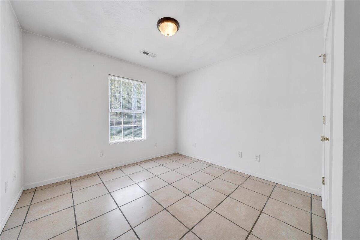 3824 Yellow Mountain Road Southeast Roanoke, VA 24014 - Photo 23 of 50 an empty room with windows