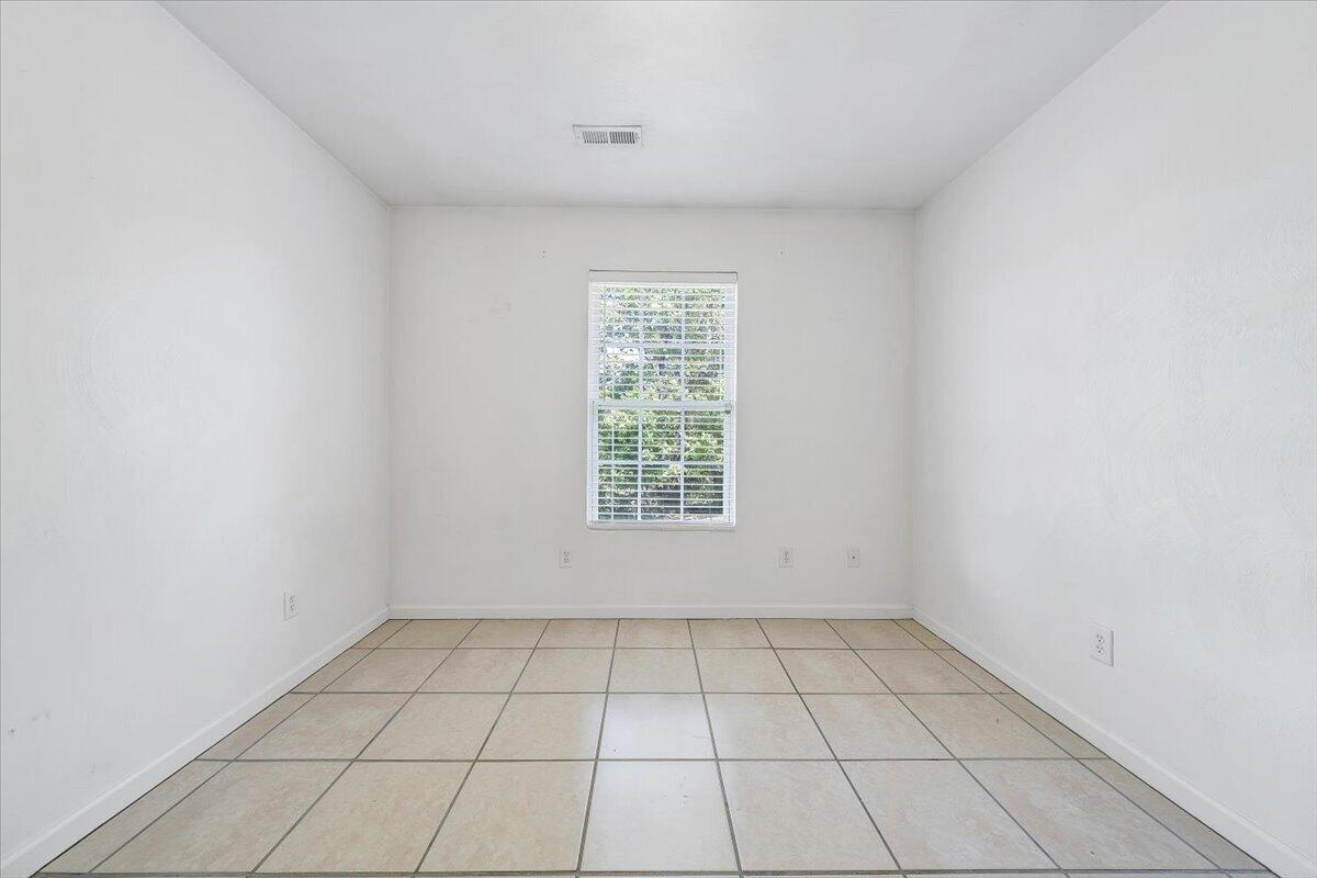 3824 Yellow Mountain Road Southeast Roanoke, VA 24014 - Photo 26 of 50 an empty room with white walls and a window