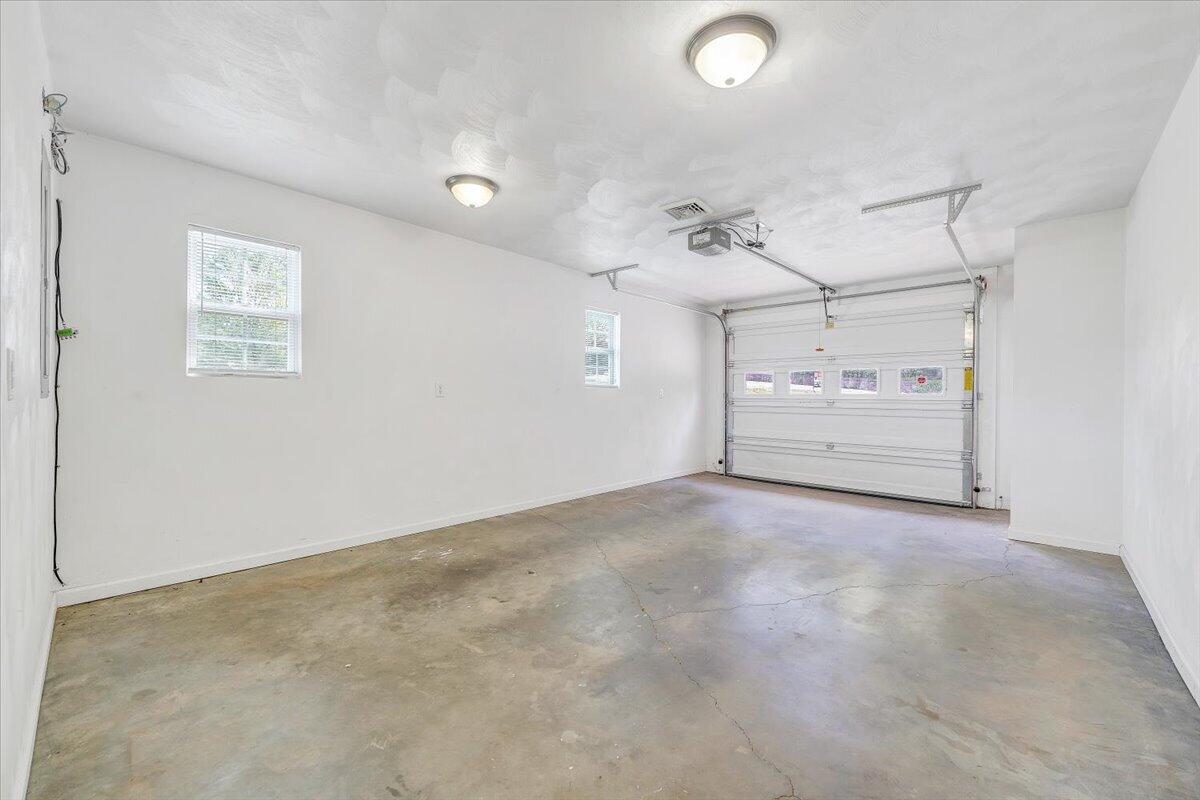 3824 Yellow Mountain Road Southeast Roanoke, VA 24014 - Photo 31 of 50 en empty room with natural light and wooden floor