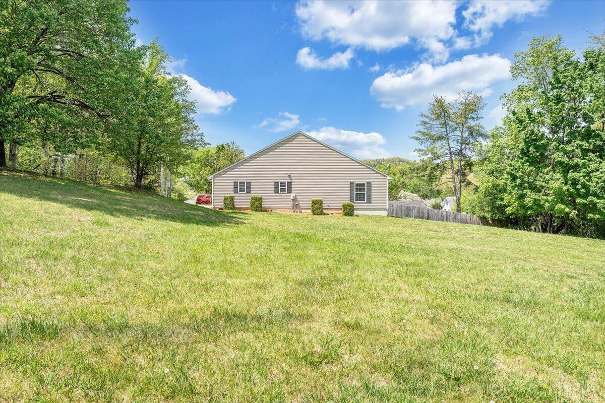 3824 Yellow Mountain Road Southeast Roanoke, VA 24014 - Photo 41 of 50 a view of a house with a yard