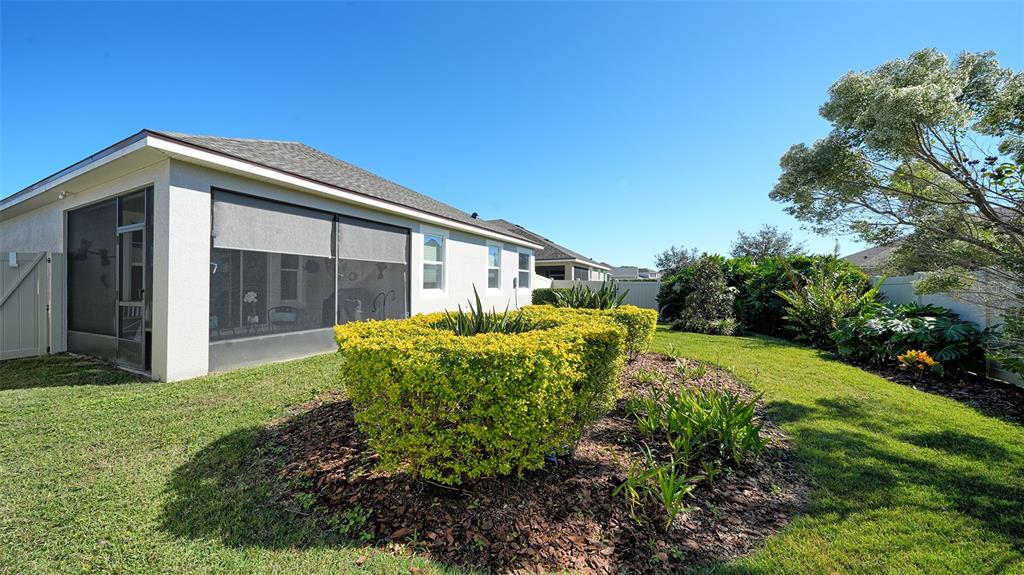 11211 Spring Gate Trail Lakewood Ranch, FL 34211 - Photo 36 of 51 a view of a house with a yard