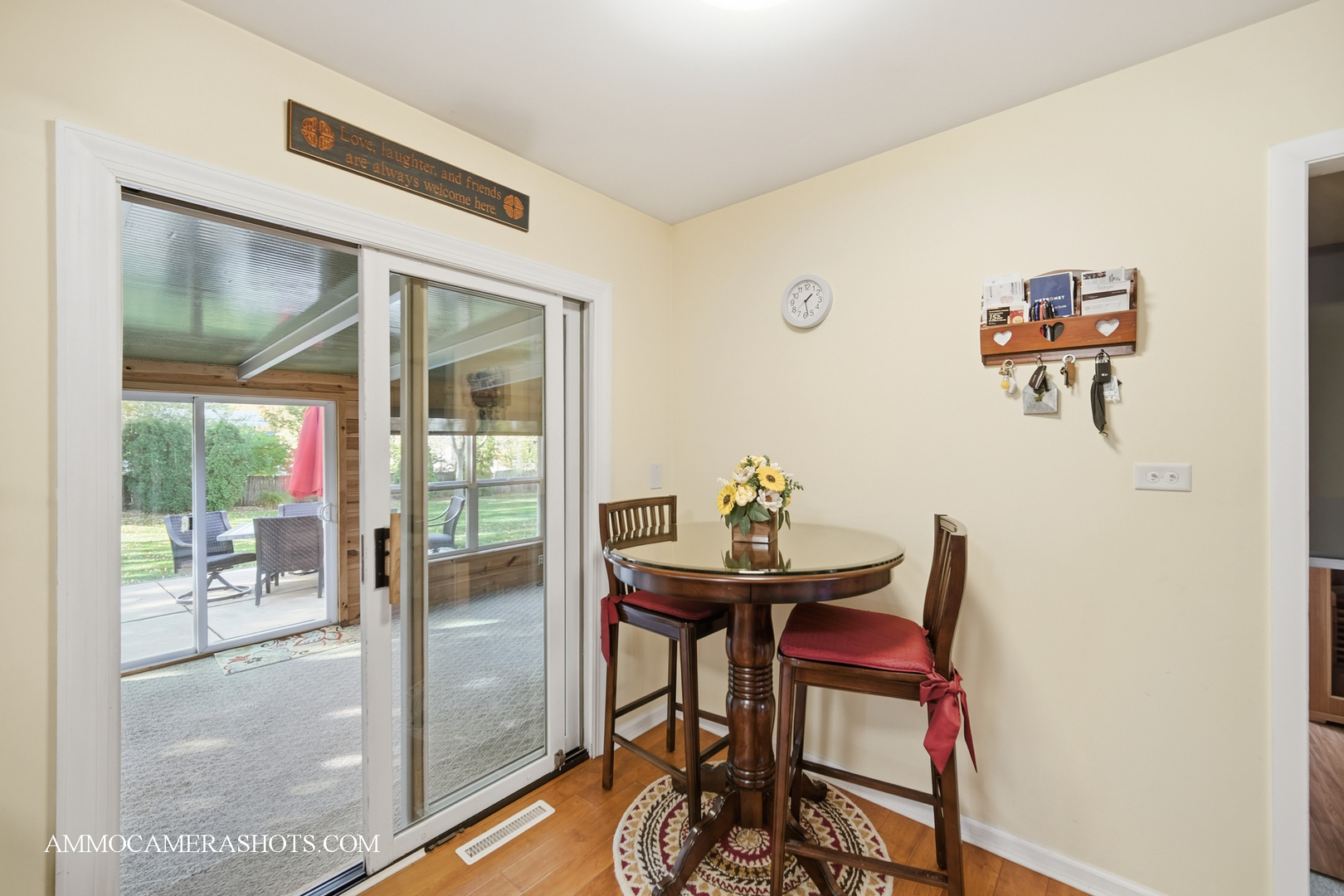 817 Woodland Hills Road Batavia, IL 60510 - Photo 12 of 38 a view of a room that has a table and chairs in it