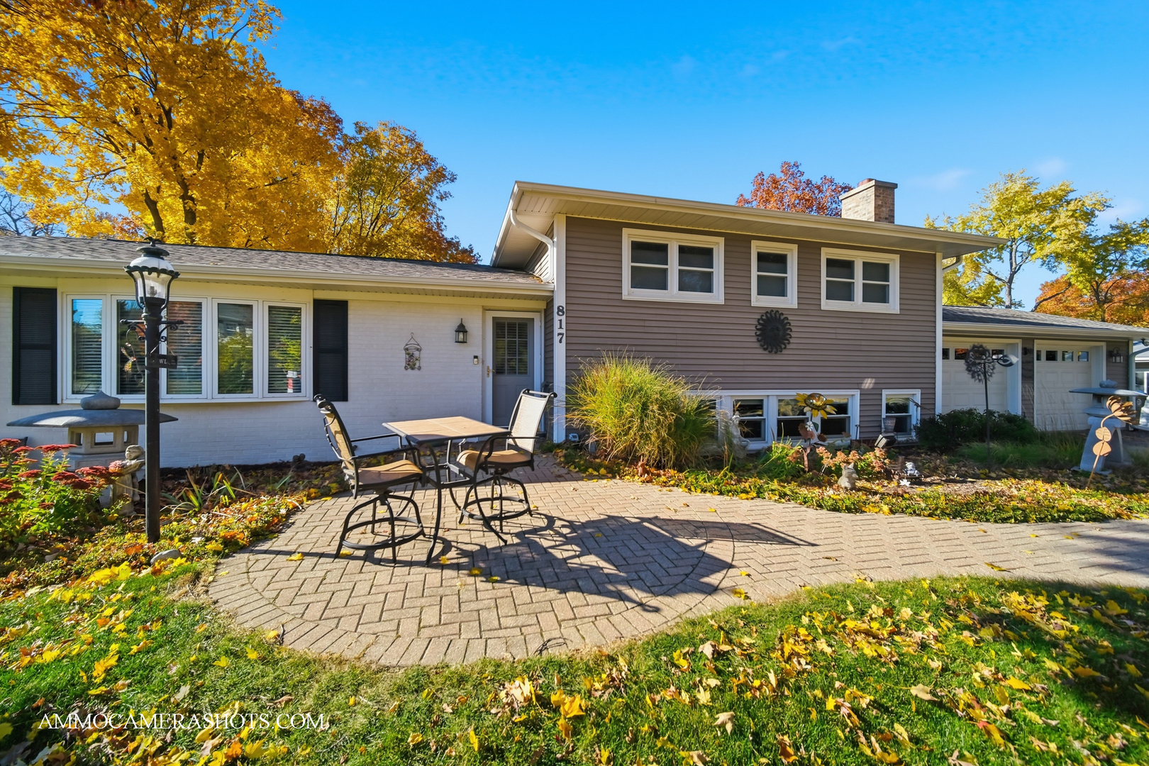 817 Woodland Hills Road Batavia, IL 60510 - Photo 2 of 38 a patio with table and chairs and potted plants